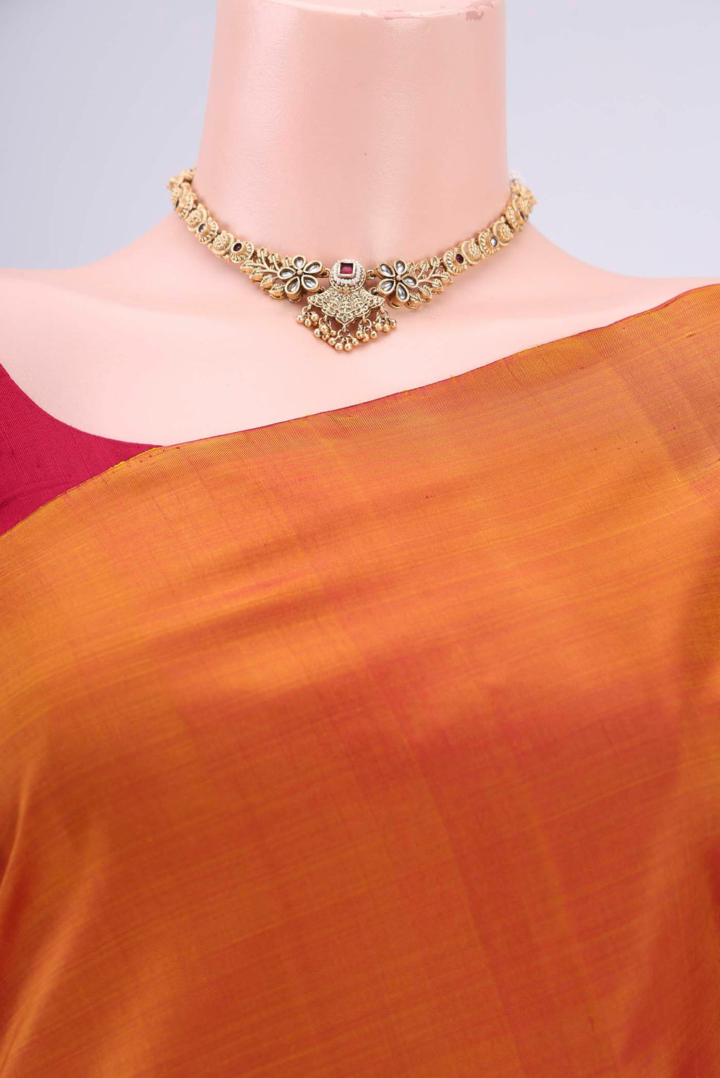 Border image of Mustard Kanchipuram Silk Saree with Plain Body and Rising Temple Border. 