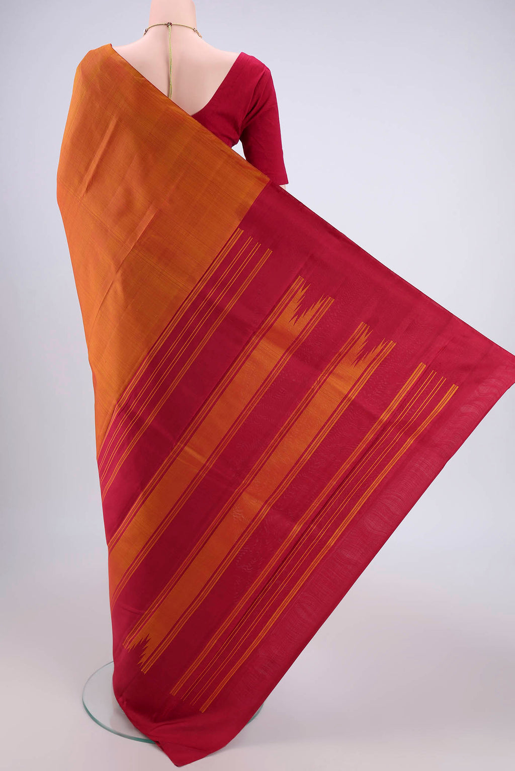 Flat view of Mustard Kanchipuram Silk Saree with Plain Body and Rising Temple Border. 