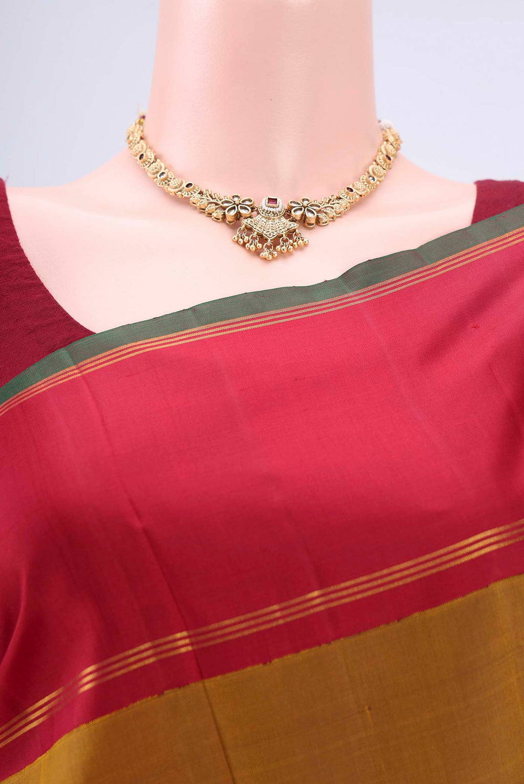 Border image of Golden Kanchipuram Silk Saree with Plain Body and Zari Border. 