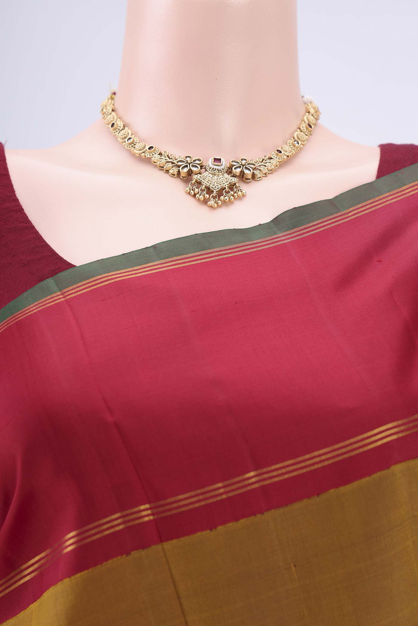 Border image of Golden Kanchipuram Silk Saree with Plain Body and Zari Border. 