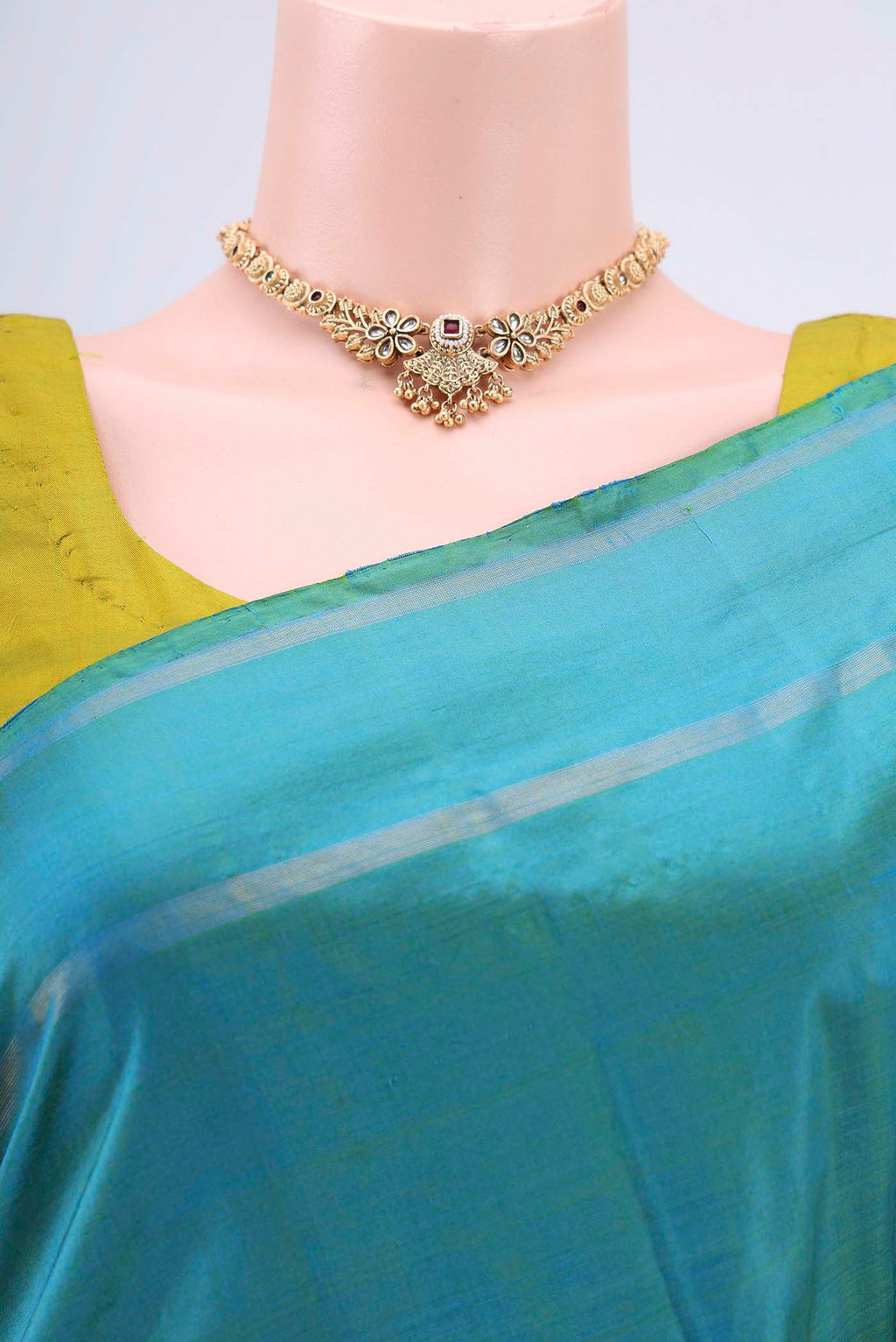Border image of Sea Green Kanchipuram Silk Saree with Plain Body and Zari And Thread Border. 