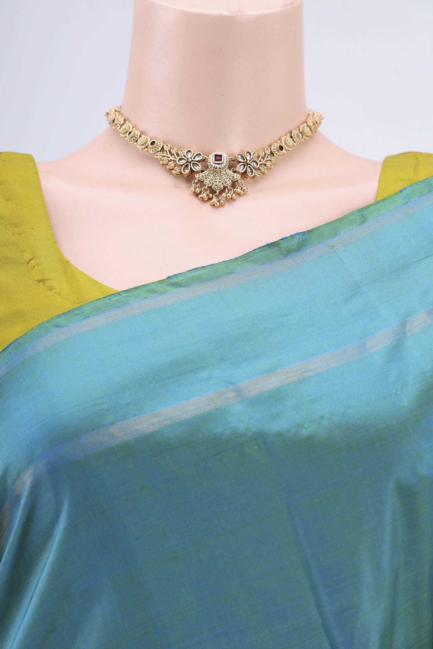 Border image of Sea Green Kanchipuram Silk Saree with Plain Body and Zari And Thread Border. 