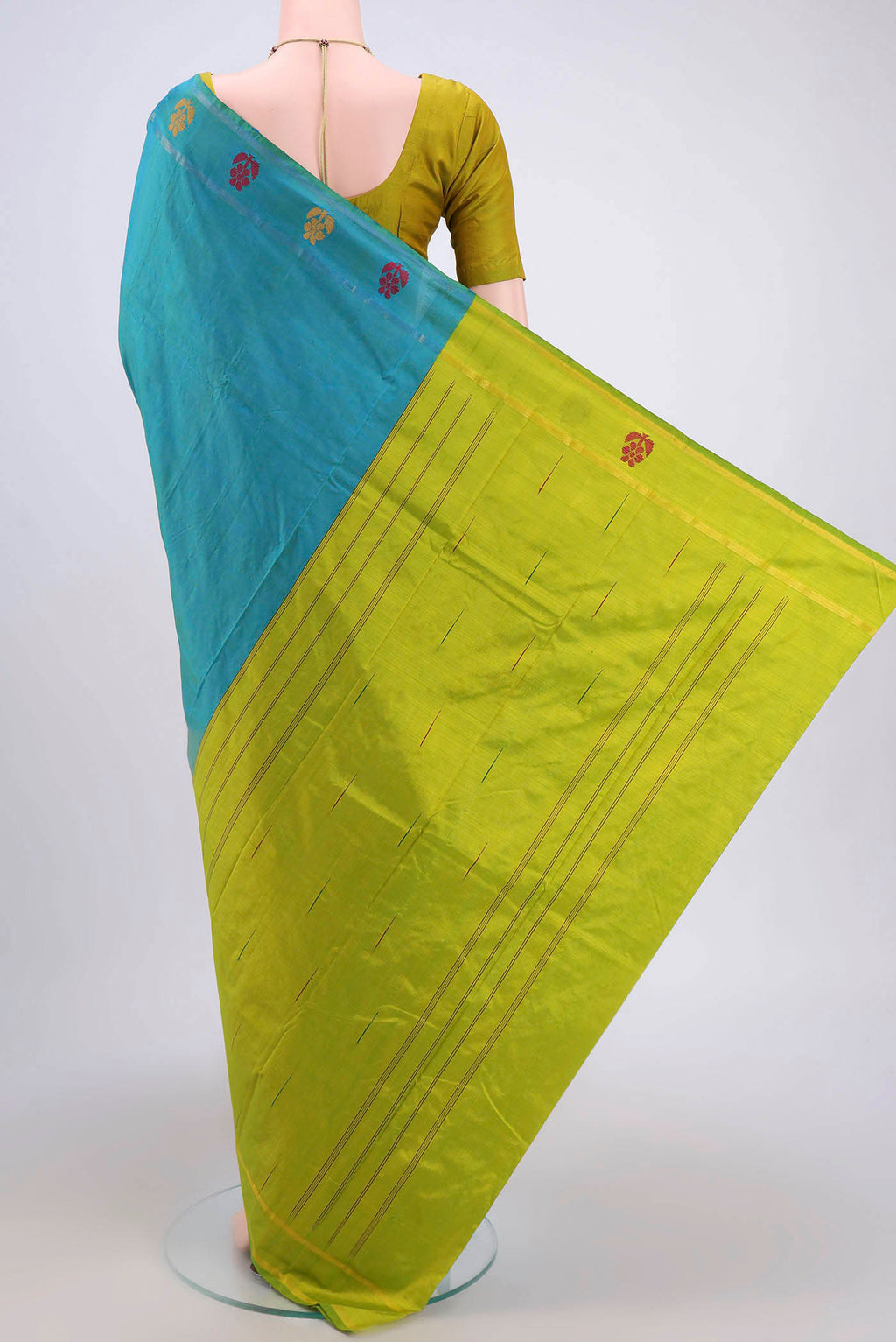 Flat view of Sea Green Kanchipuram Silk Saree with Plain Body and Zari And Thread Border. 