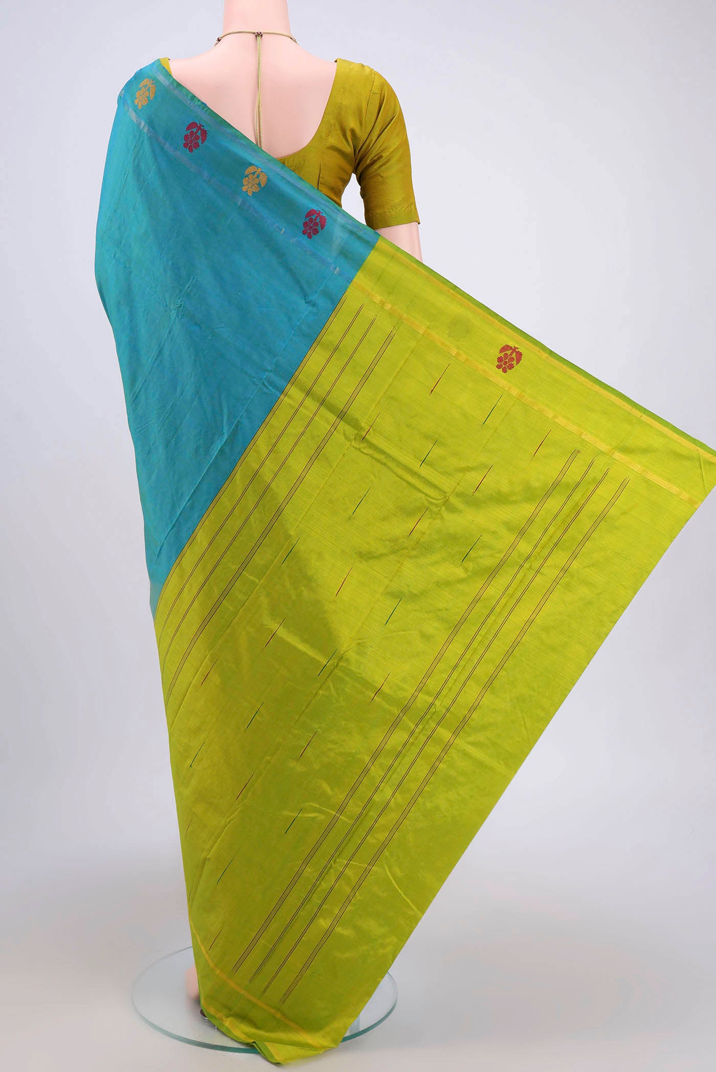 Flat view of Sea Green Kanchipuram Silk Saree with Plain Body and Zari And Thread Border. 