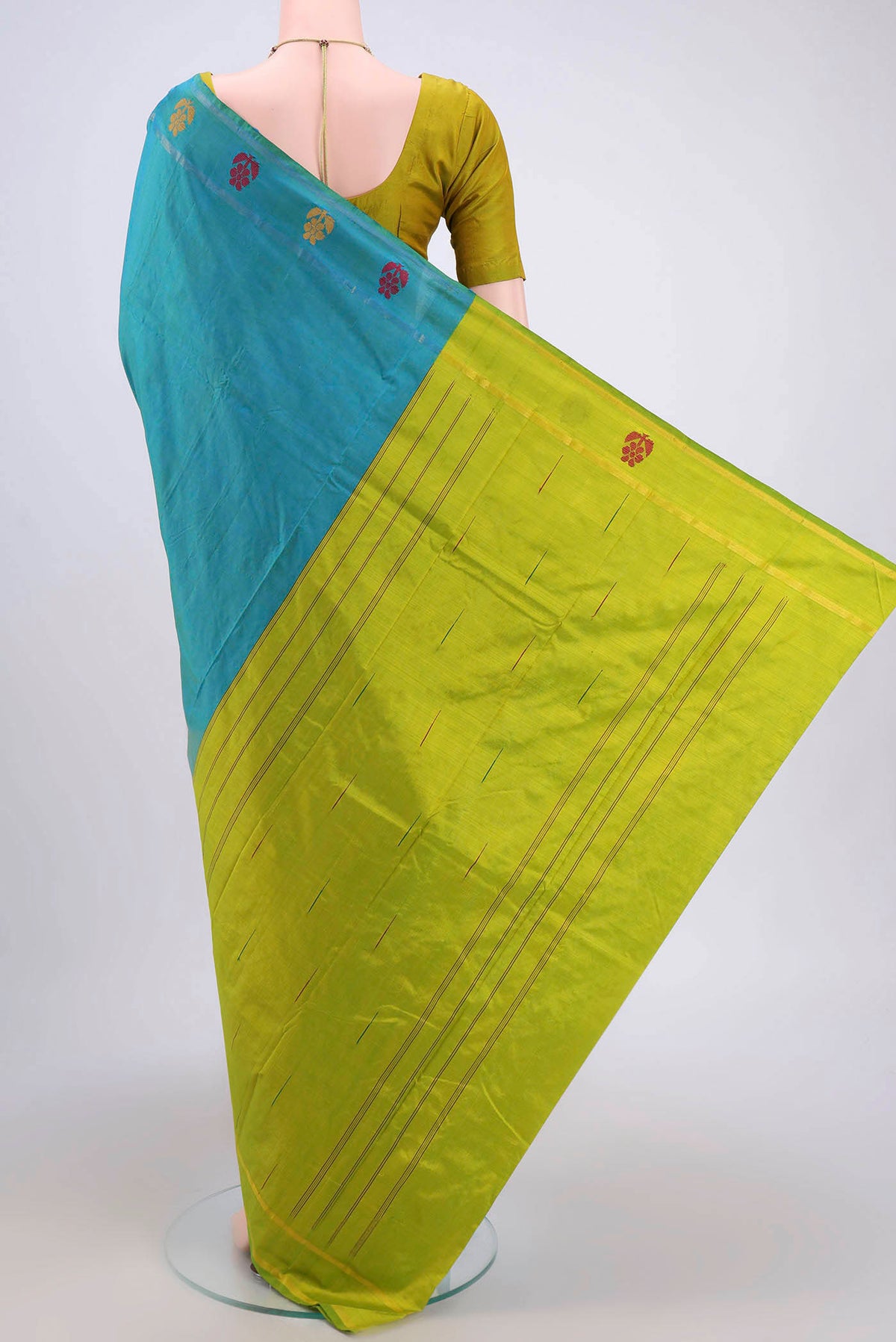 Flat view of Sea Green Kanchipuram Silk Saree with Plain Body and Zari And Thread Border. 