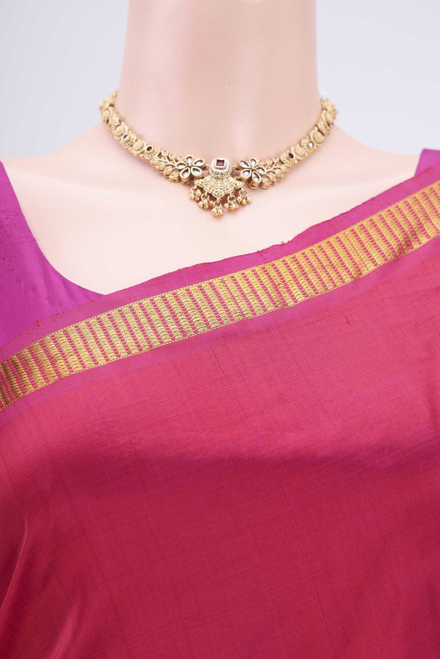 Border image of Dark Pink Kanchipuram Silk Saree with Plain Body and Zari Border. 