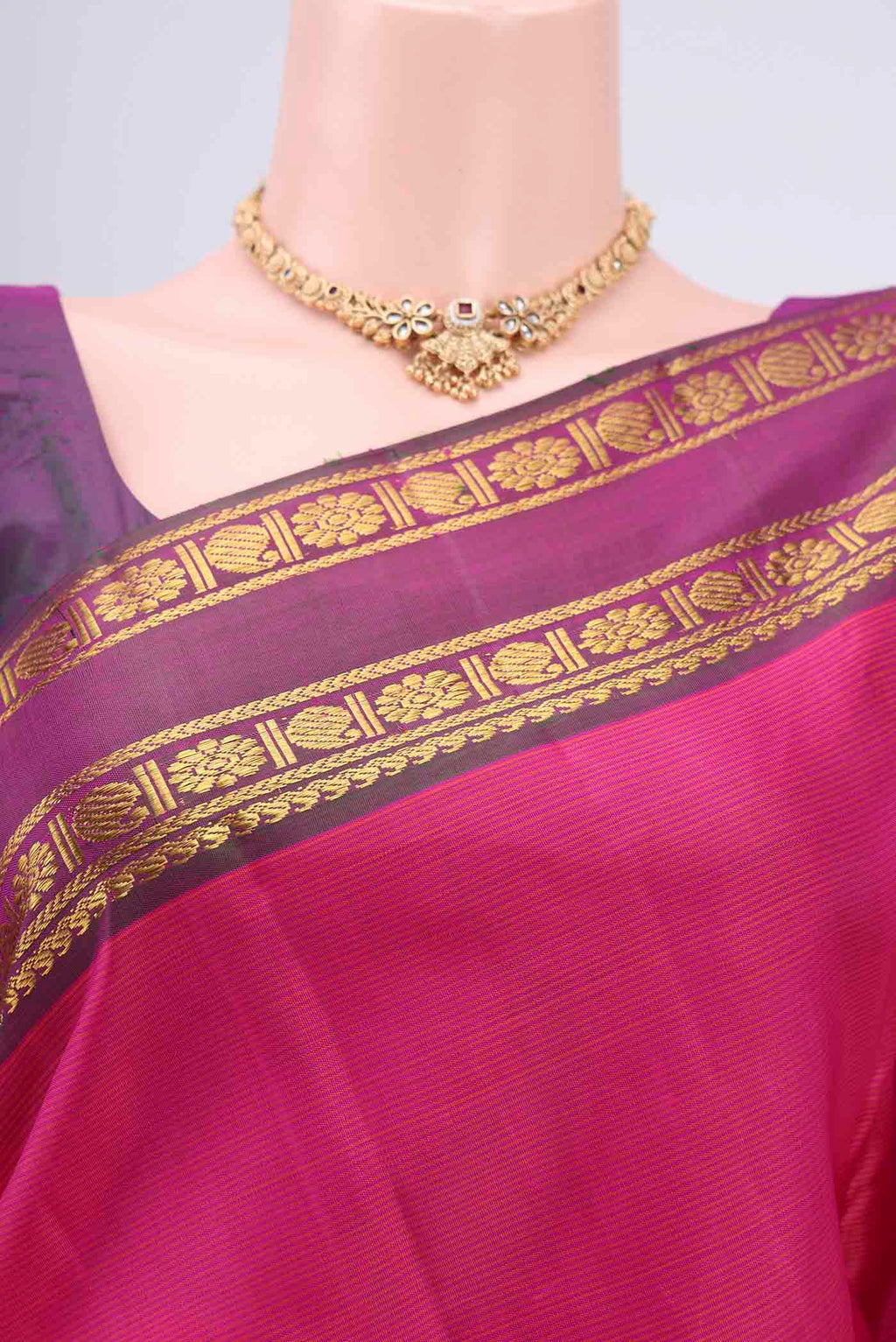 Border image of Pink Kanchipuram Silk Saree with Stripes on the body and Zari Border. 