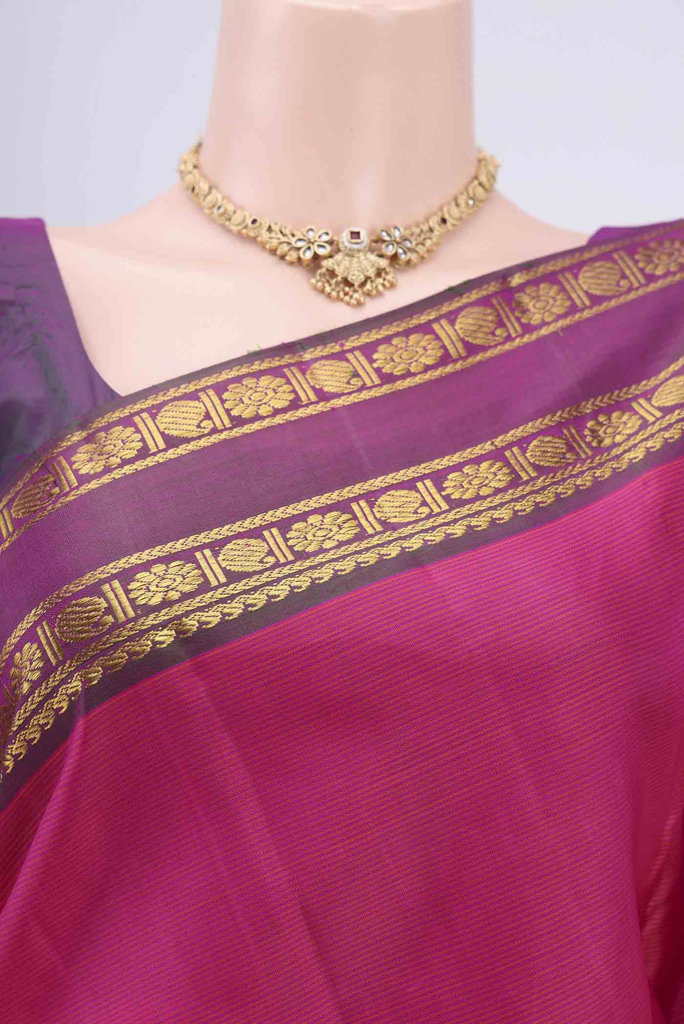 Border image of Pink Kanchipuram Silk Saree with Stripes on the body and Zari Border. 