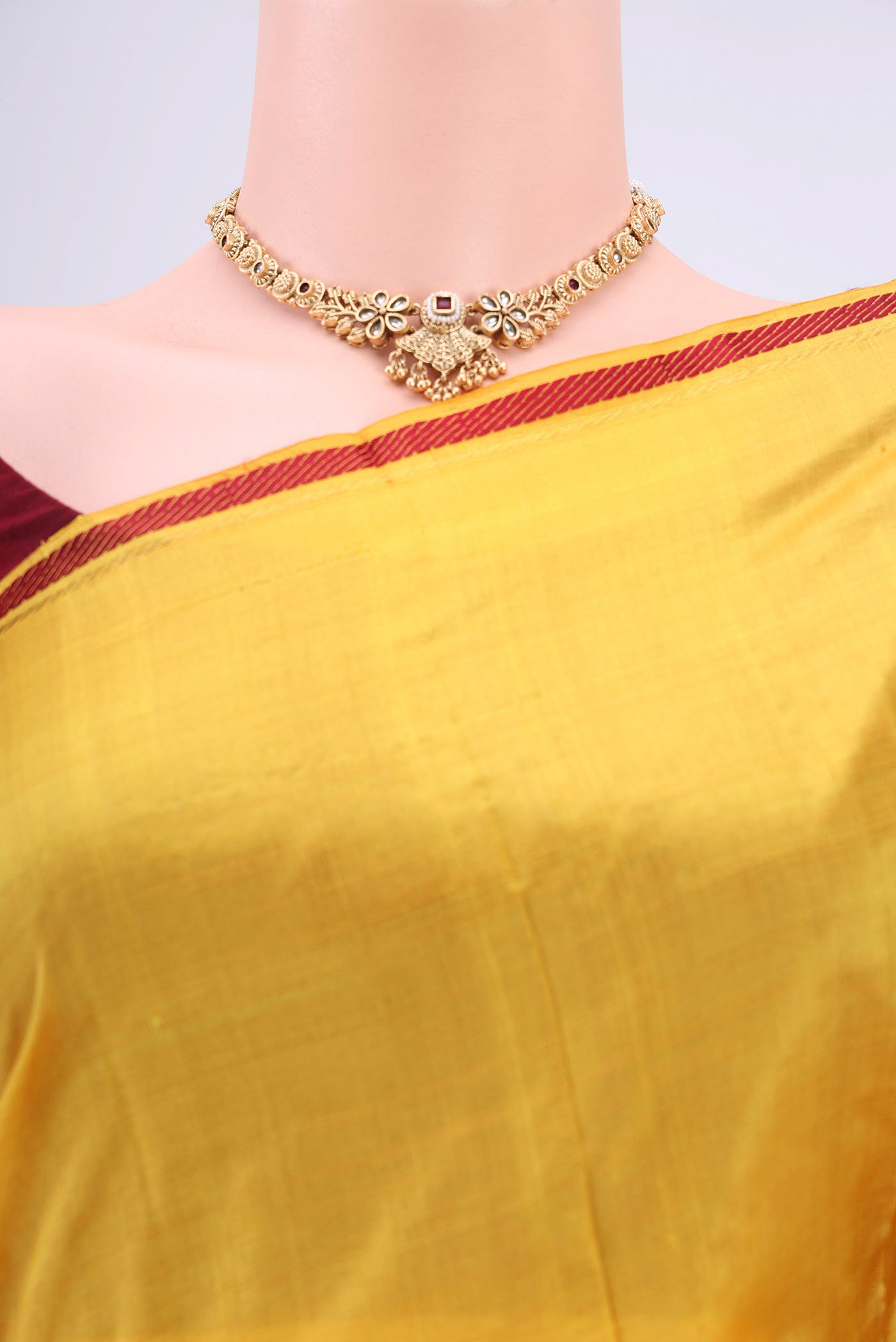 Border image of Yellow Kanchipuram Saree with Plain Body and Plain Border. 