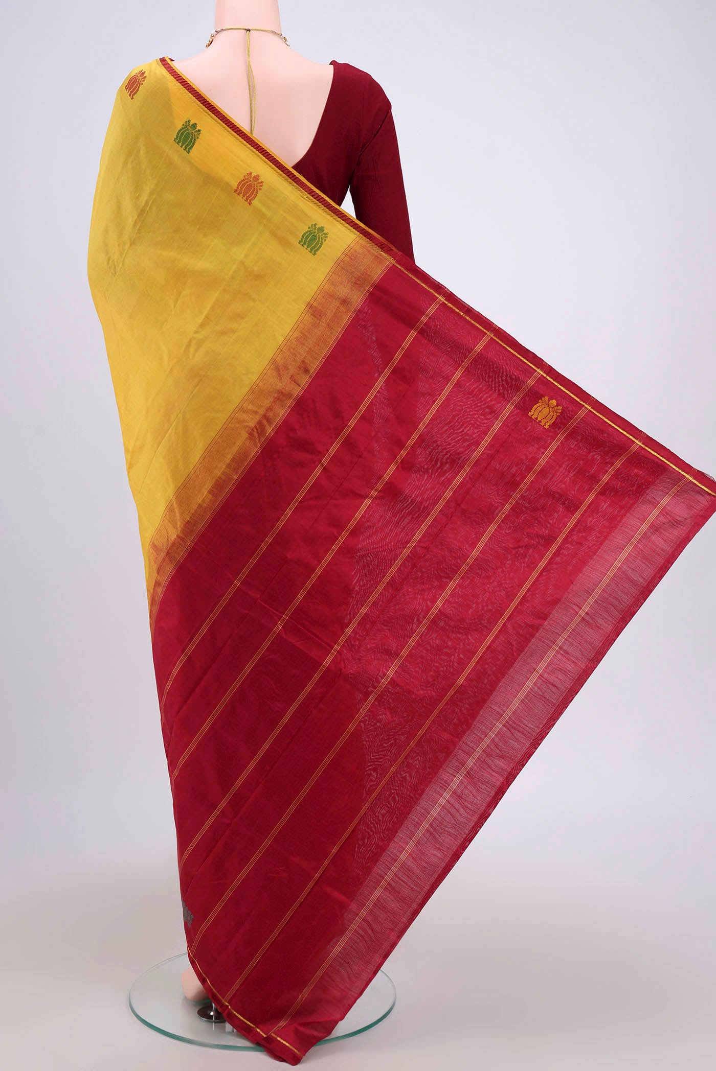 Flat view of Yellow Kanchipuram Saree with Plain Body and Plain Border. 
