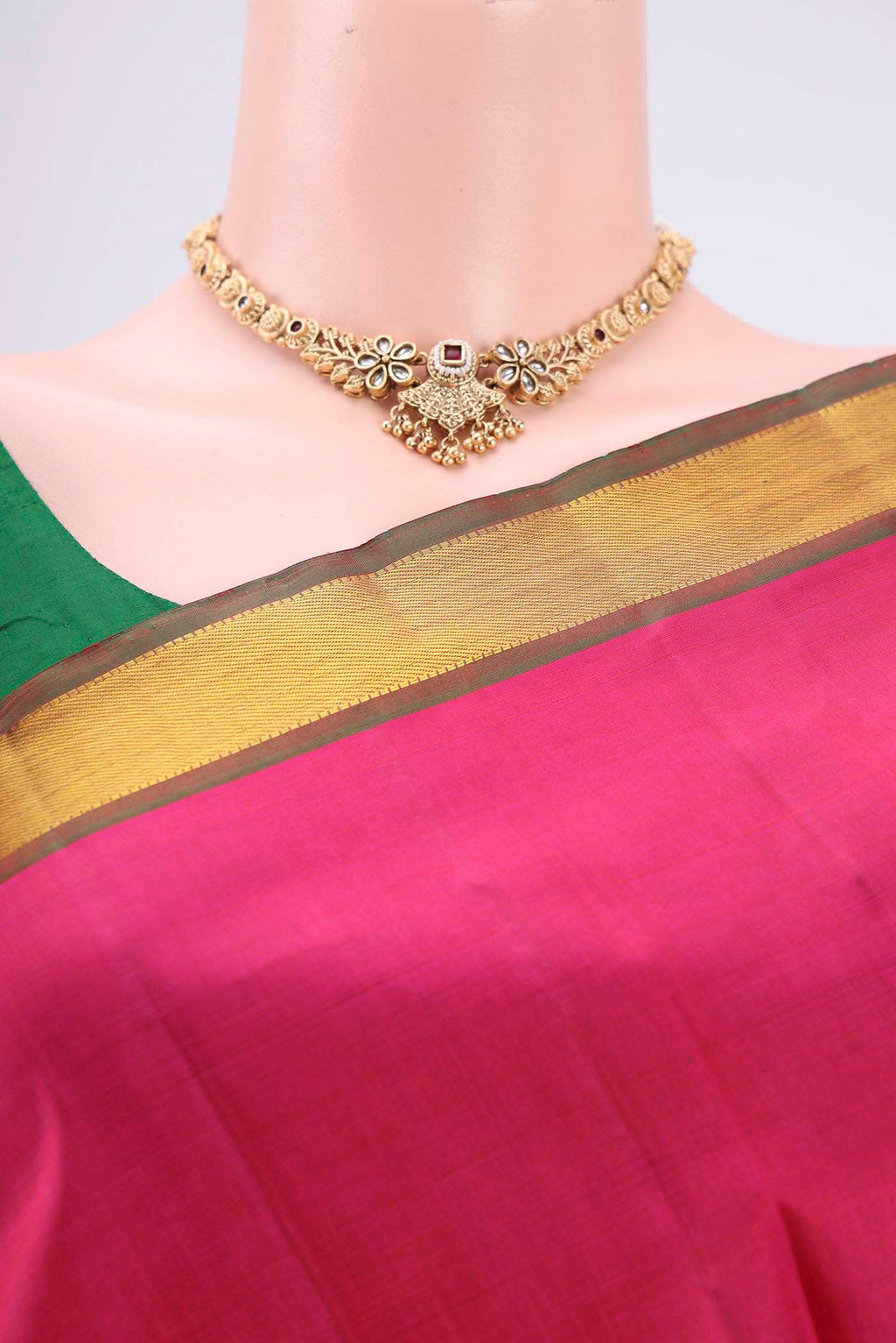 Border image of Pink Kanjivaram Silk Saree with Plain Body and Zari Border. 