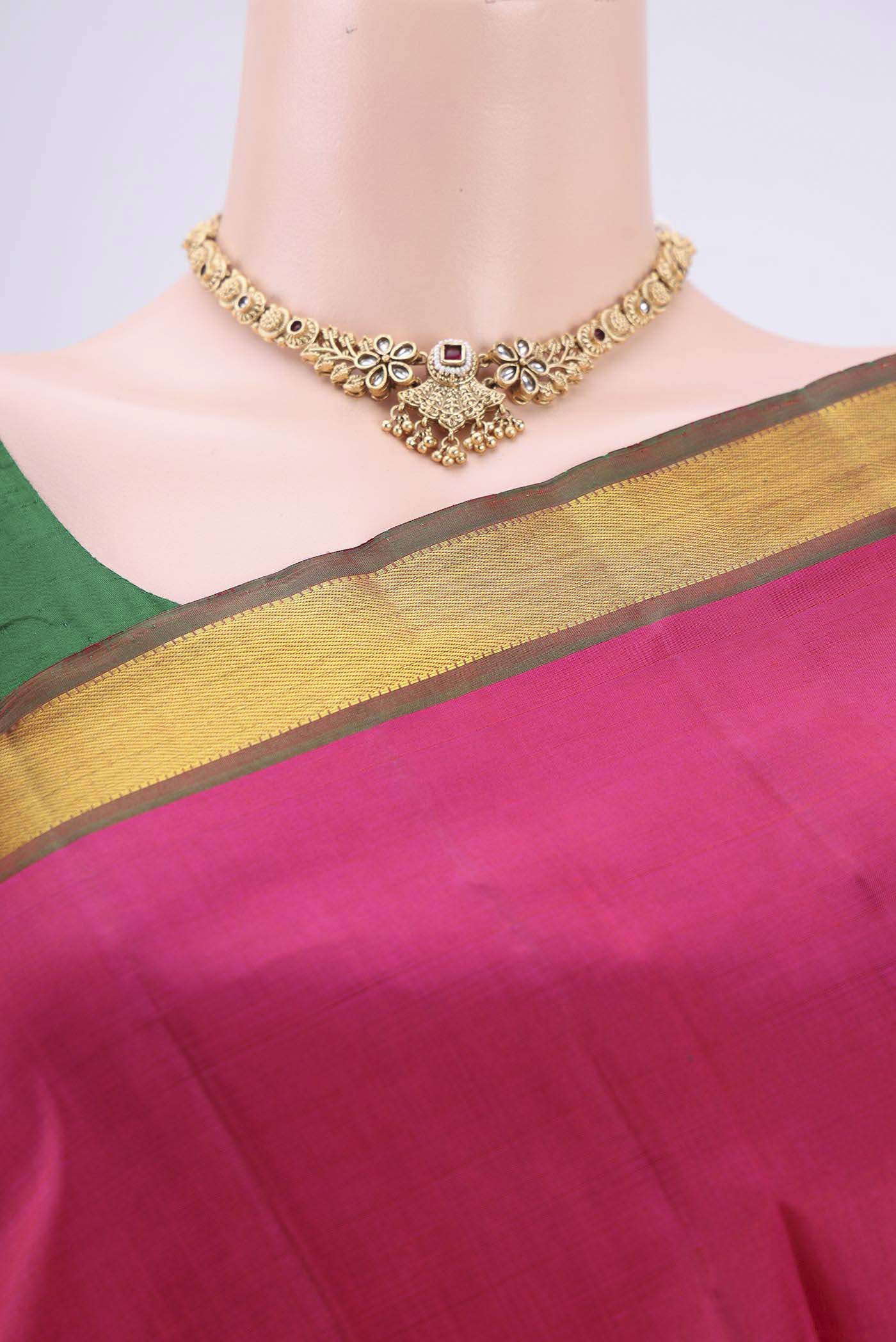 Border image of Pink Kanjivaram Silk Saree with Plain Body and Zari Border. 
