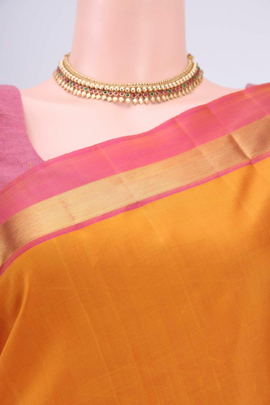 Border image of Mustard Kanjivaram Silk Saree with Plain Body and Zari Border. 