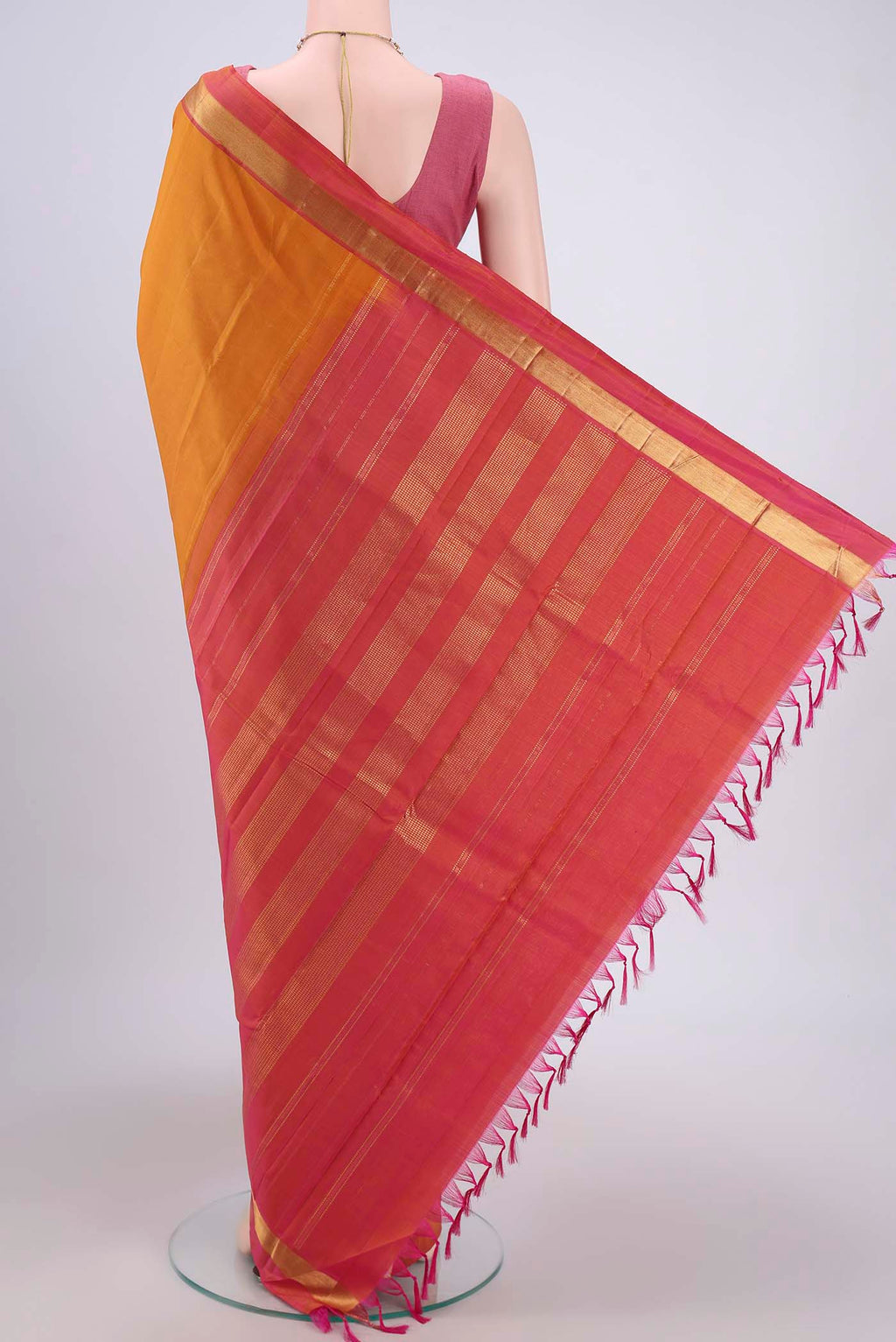 Flat view of Mustard Kanjivaram Silk Saree with Plain Body and Zari Border. 