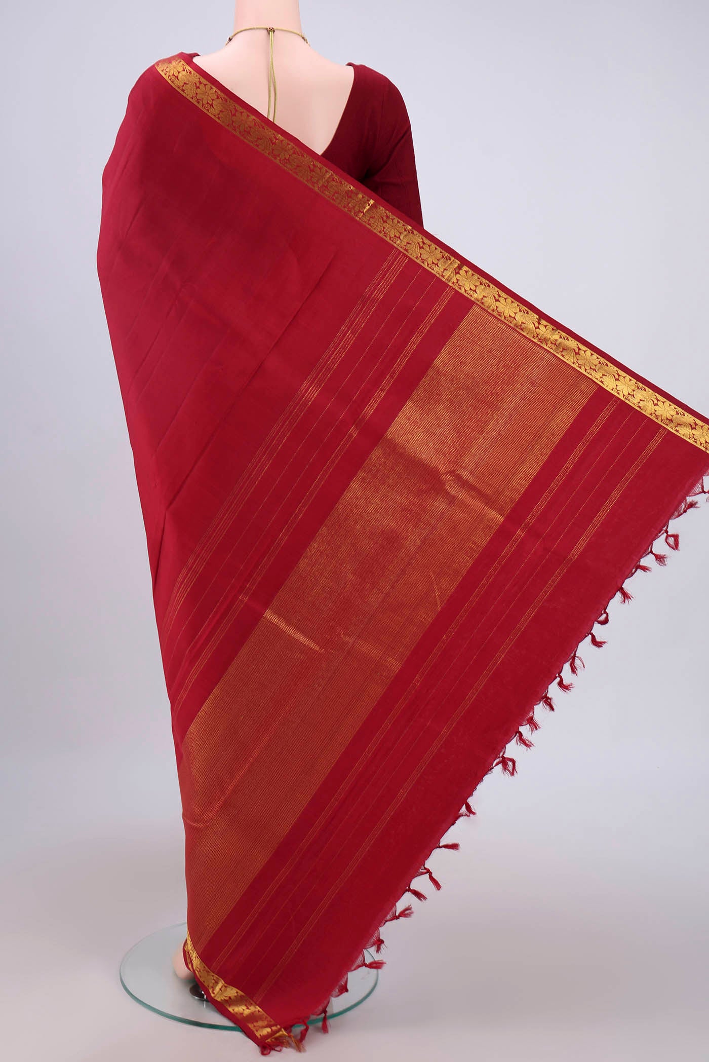 Flat view of Maroon Dual Tone Kanjivaram Silk Saree with Plain Body and Zari And Thread Border. 