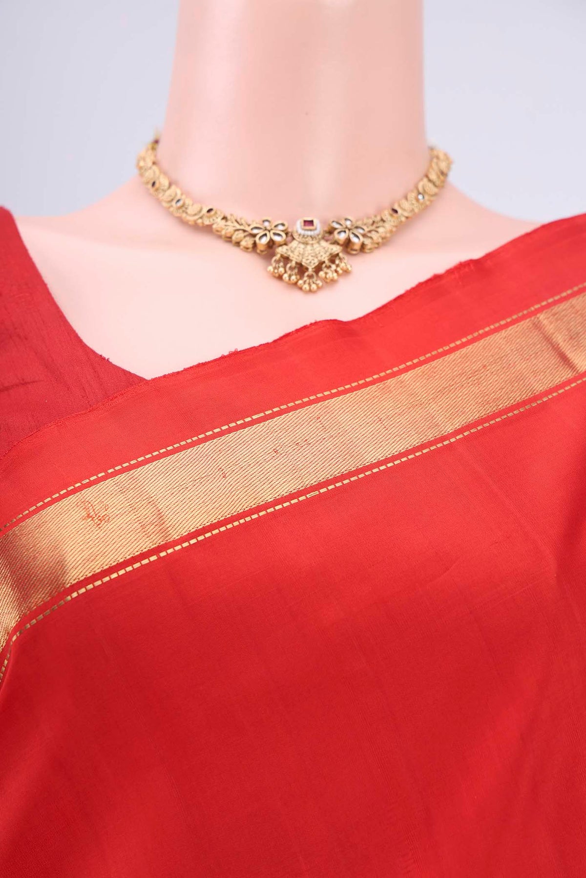 Border image of Red Dual Tone Kanjivaram Silk Saree with Plain Body and Zari Border. 