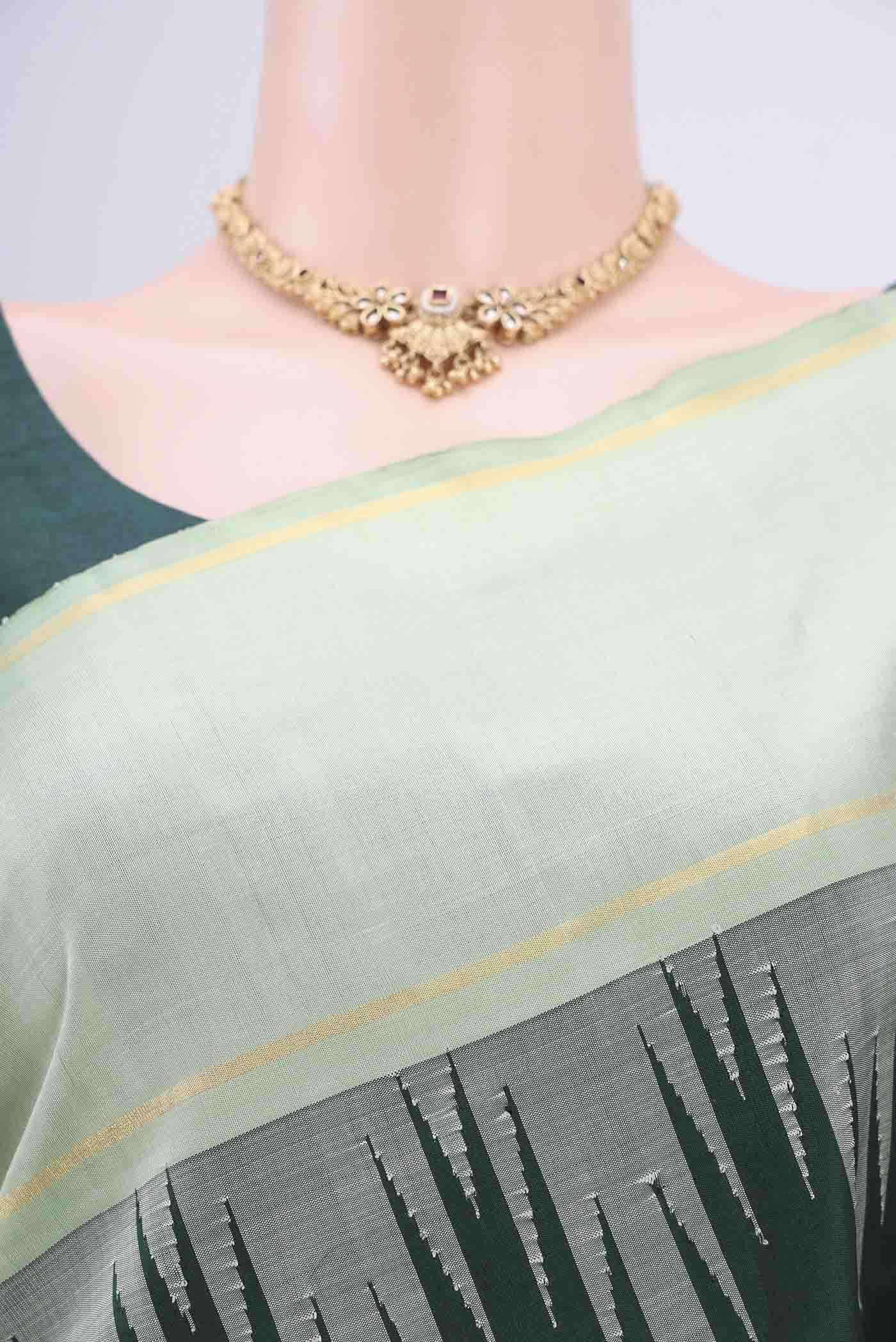 Border image of Bottle Green Kanjivaram Silk Saree with Plain Body and Temple Border. 