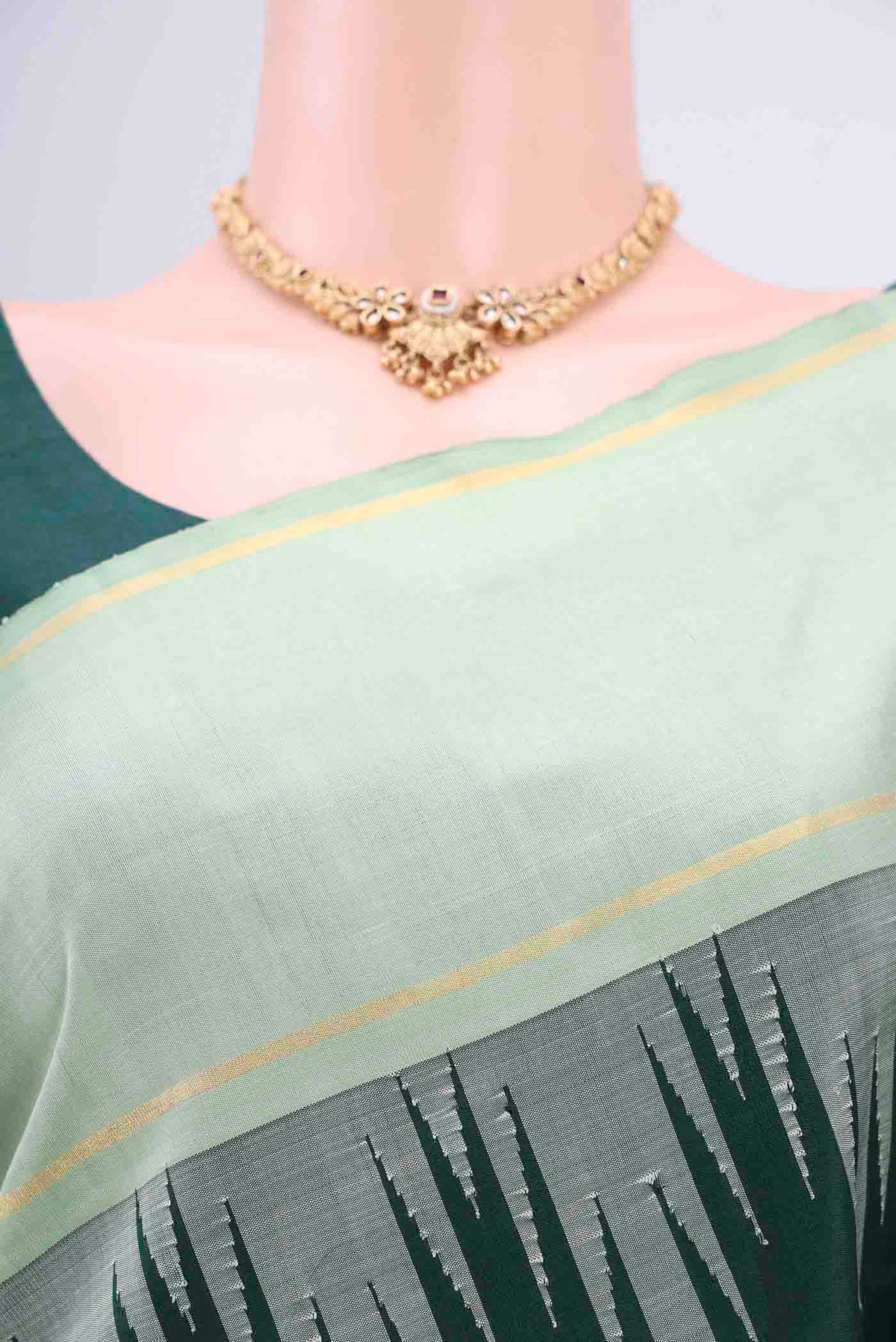 Border image of Bottle Green Kanjivaram Silk Saree with Plain Body and Temple Border. 