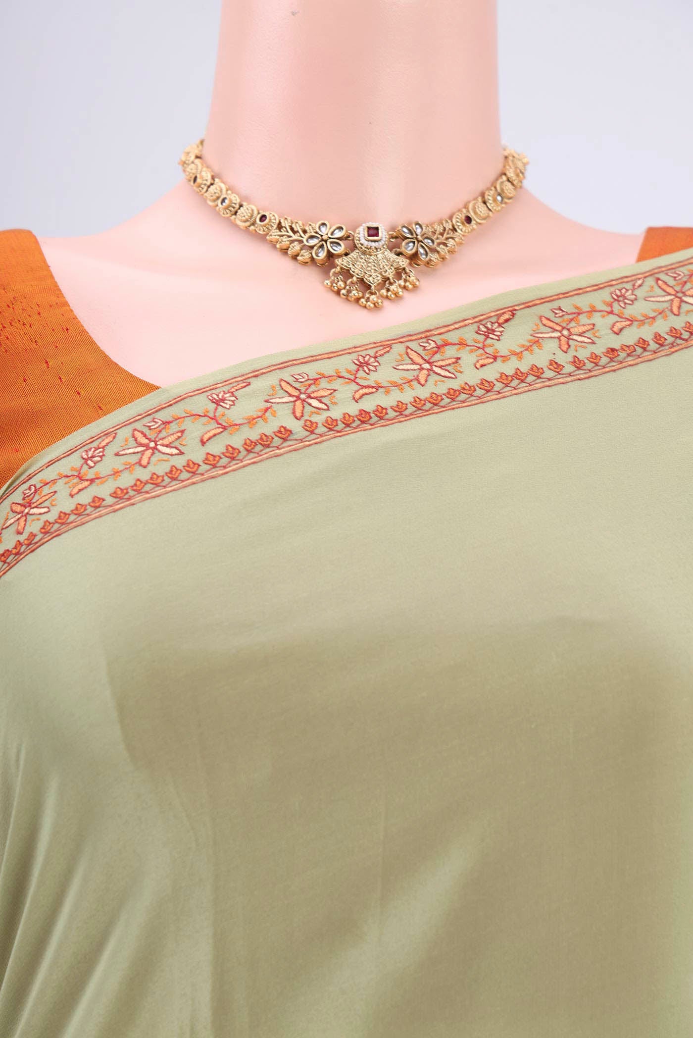 Border image of Sage Green Kashmiri Saree with Plain Body and Thread Border. 