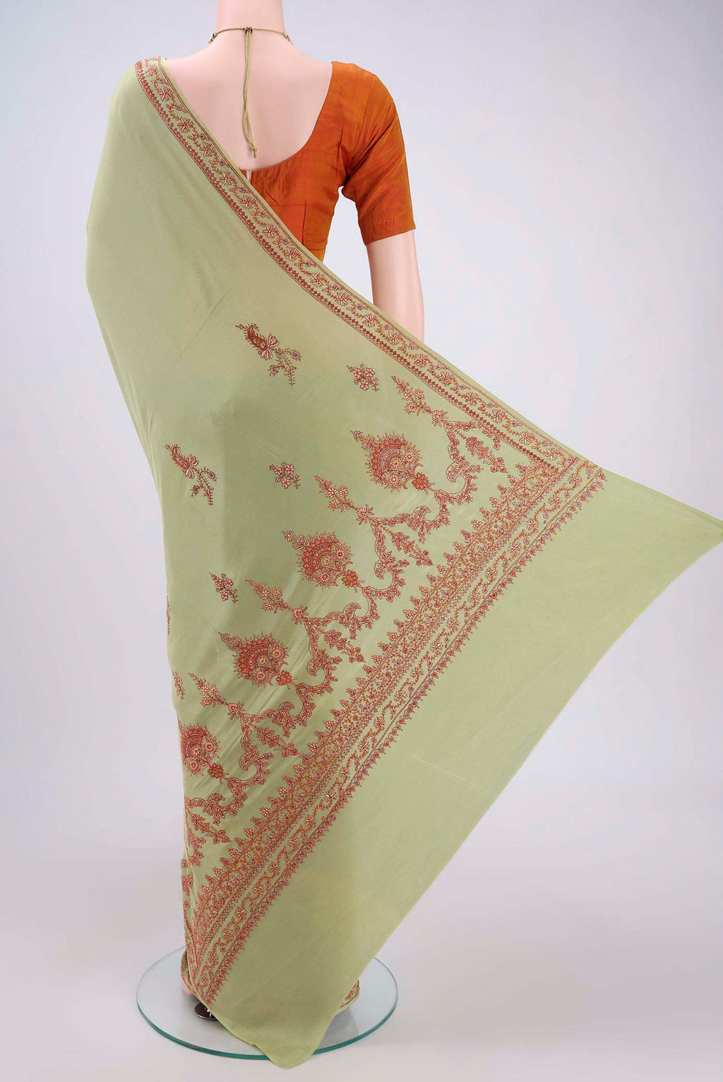 Flat view of Sage Green Kashmiri Saree with Plain Body and Thread Border. 