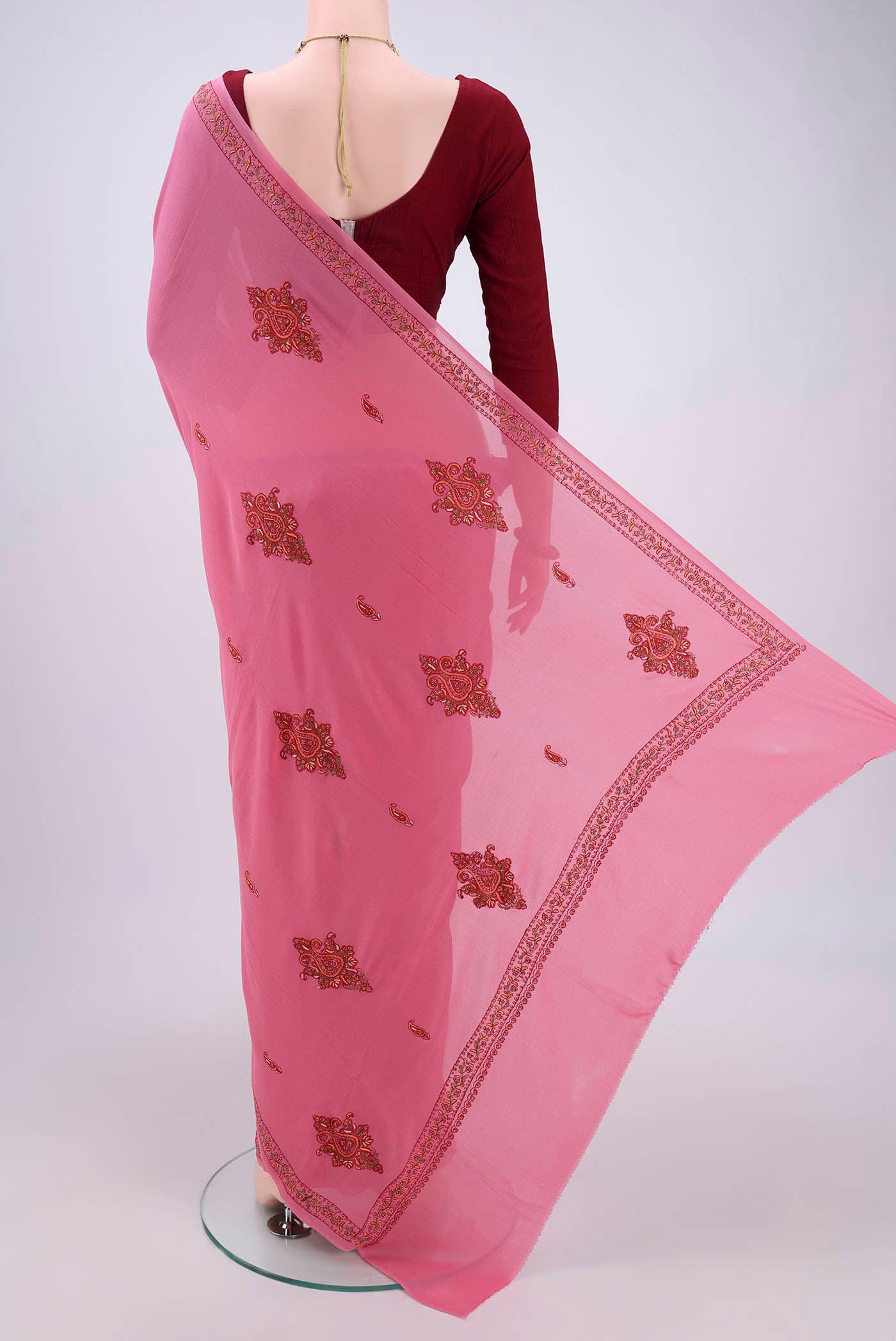 Flat view of Pink Kashmiri Saree with Plain Body and Thread Border. 