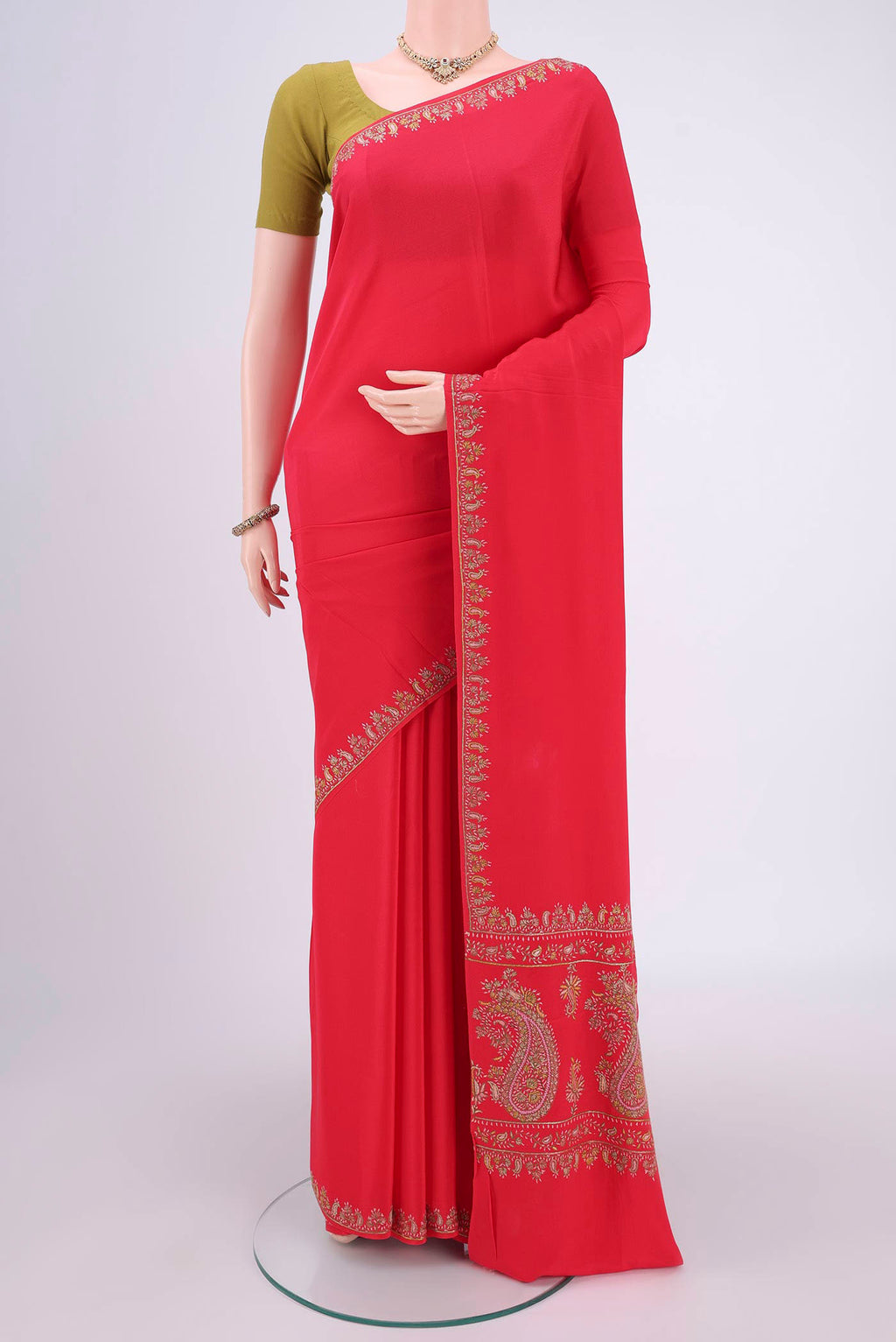 Red Kashmiri Saree with Plain Body and Thread Border.  displayed on a mannequin