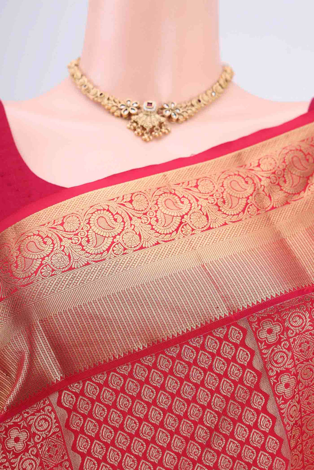 Border image of Red Bangalore Silk Saree with Zari Brocade on the body and Zari Border. 