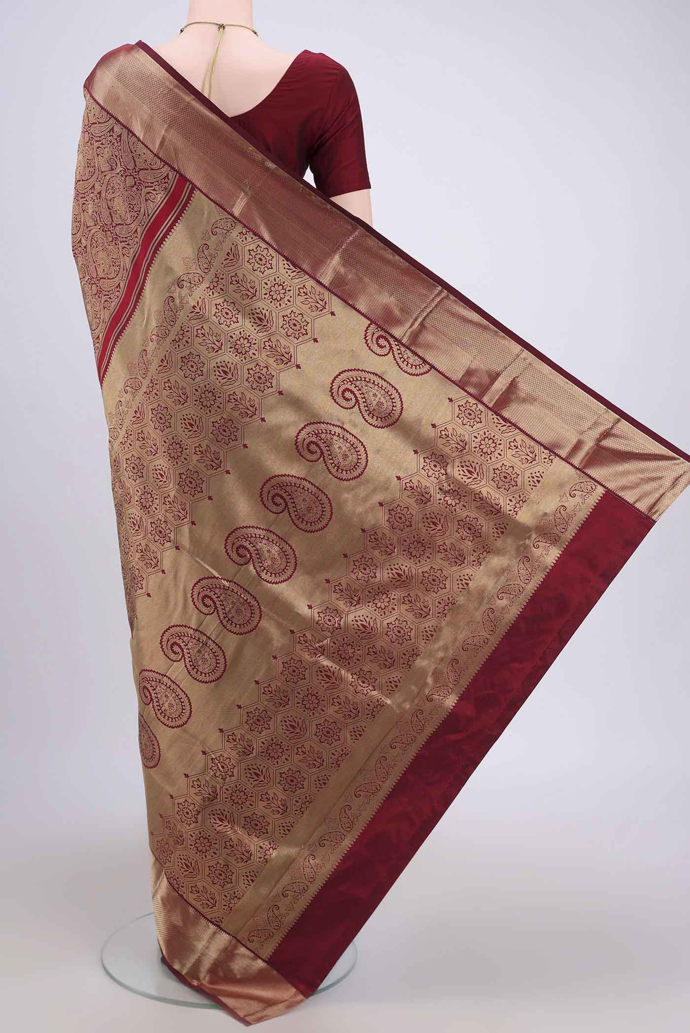Flat view of Maroon Bangalore Silk Saree with Zari Brocade on the body and Zari Border. 