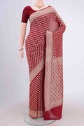 Maroon Banarasi Georgette Saree with Zari Brocade on the body and Zari Border.  displayed on a mannequin