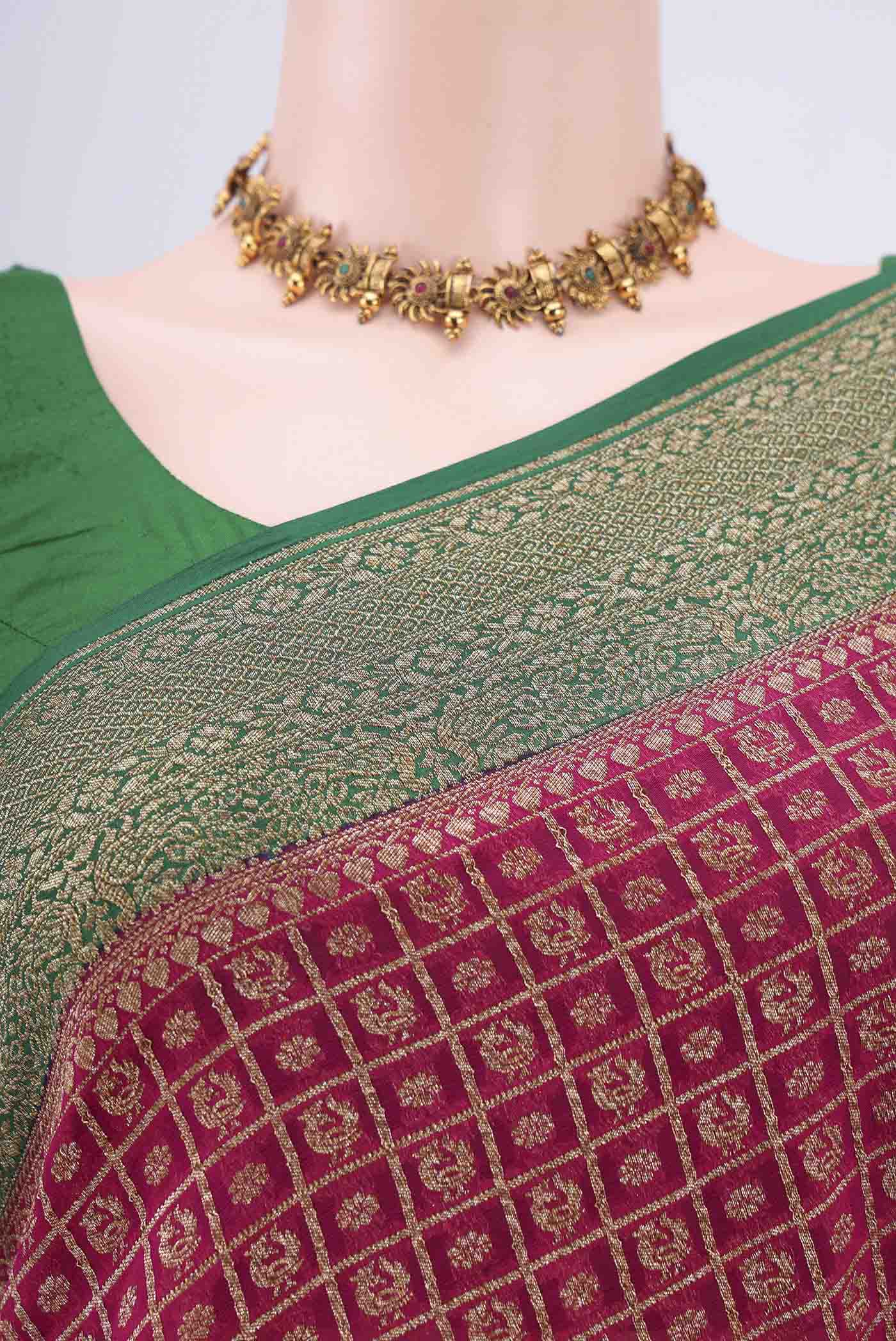 Border image of Dark Pink Banarasi Georgette Saree with Checked design on the body and Zari Border. 