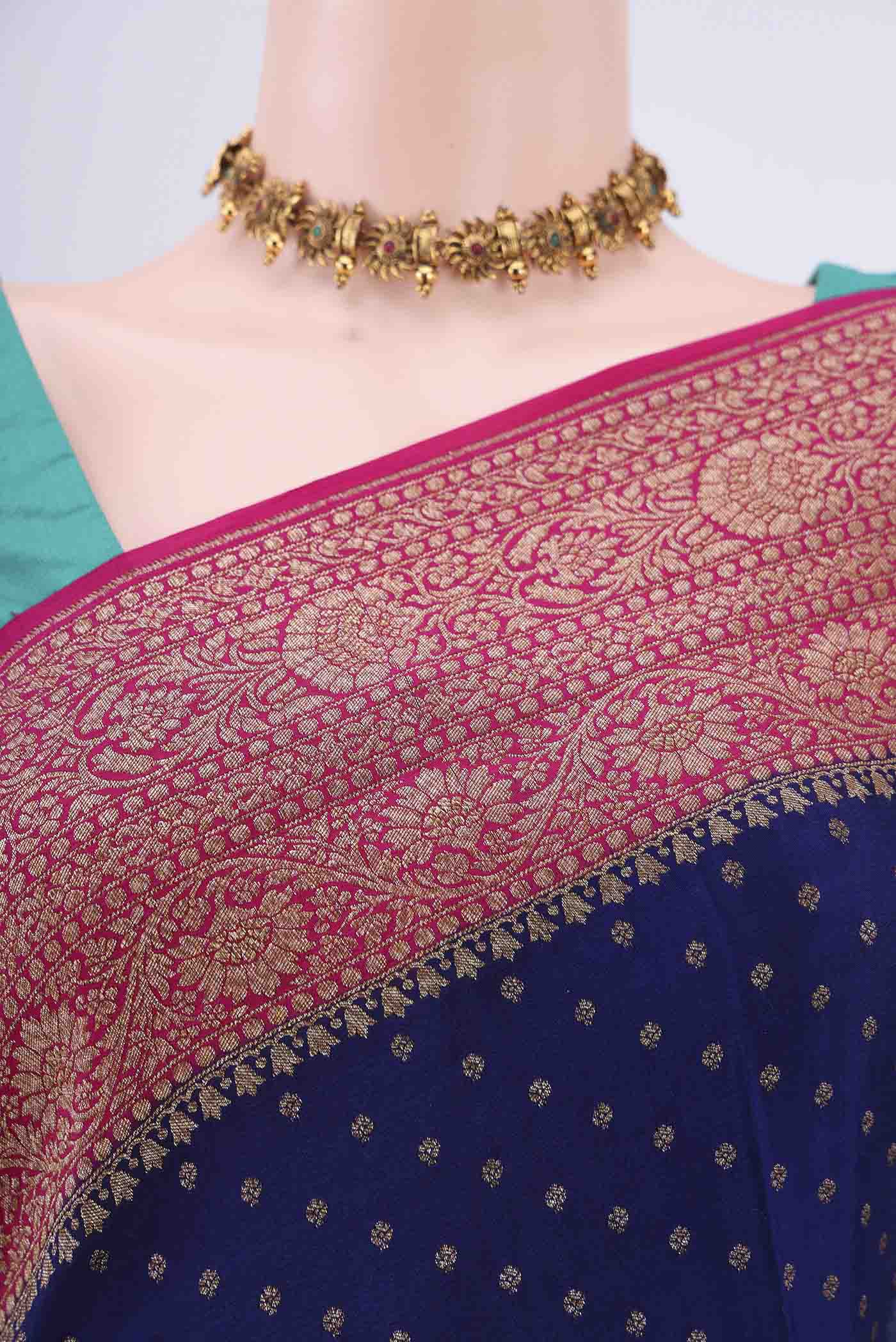 Border image of Royal Blue Banarasi Georgette Saree with Zari Butta on the body and Zari Border. 