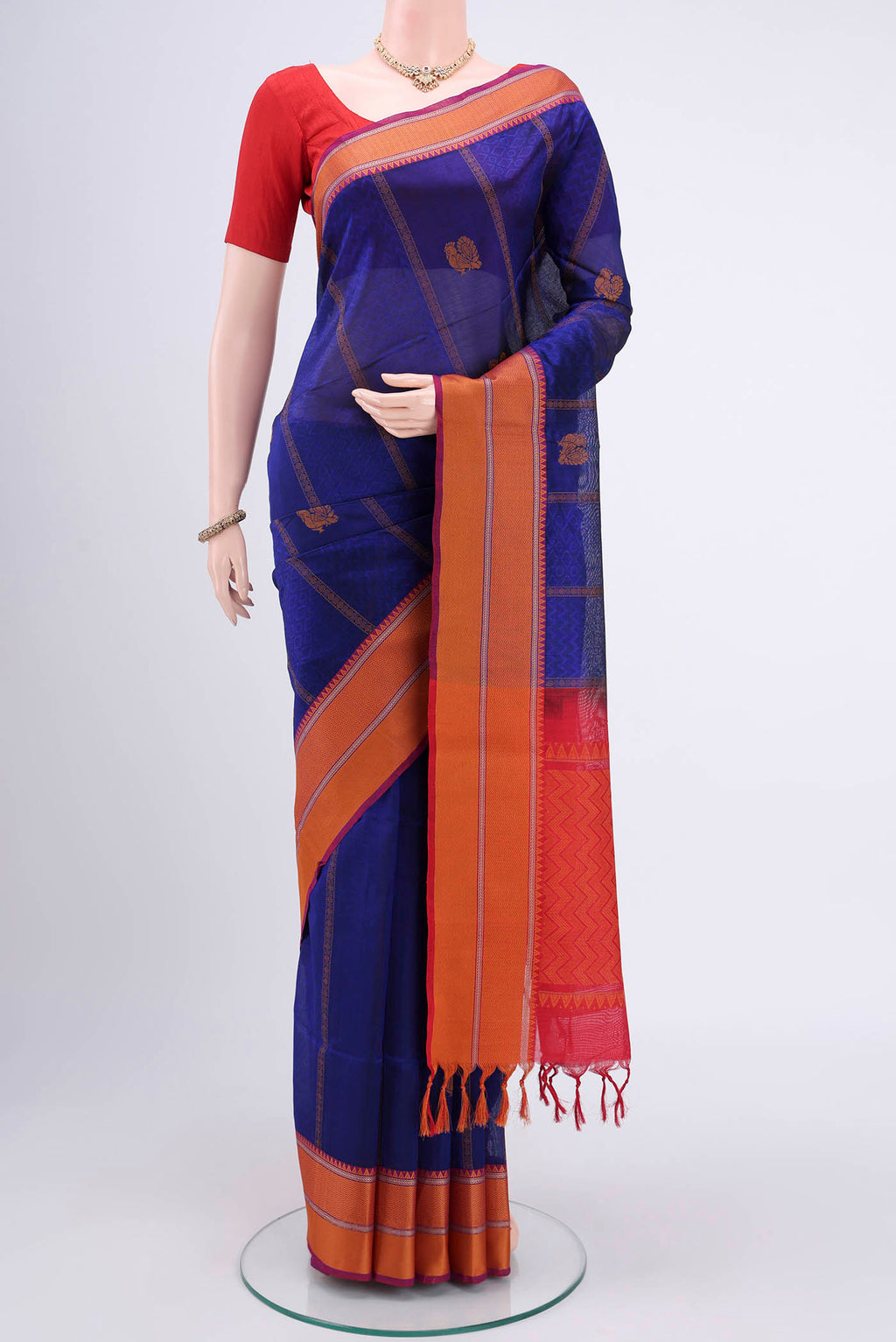 Navy Blue Coimbatore Silk Cotton Saree with Thread Butta on the body and Thread Border.  displayed on a mannequin
