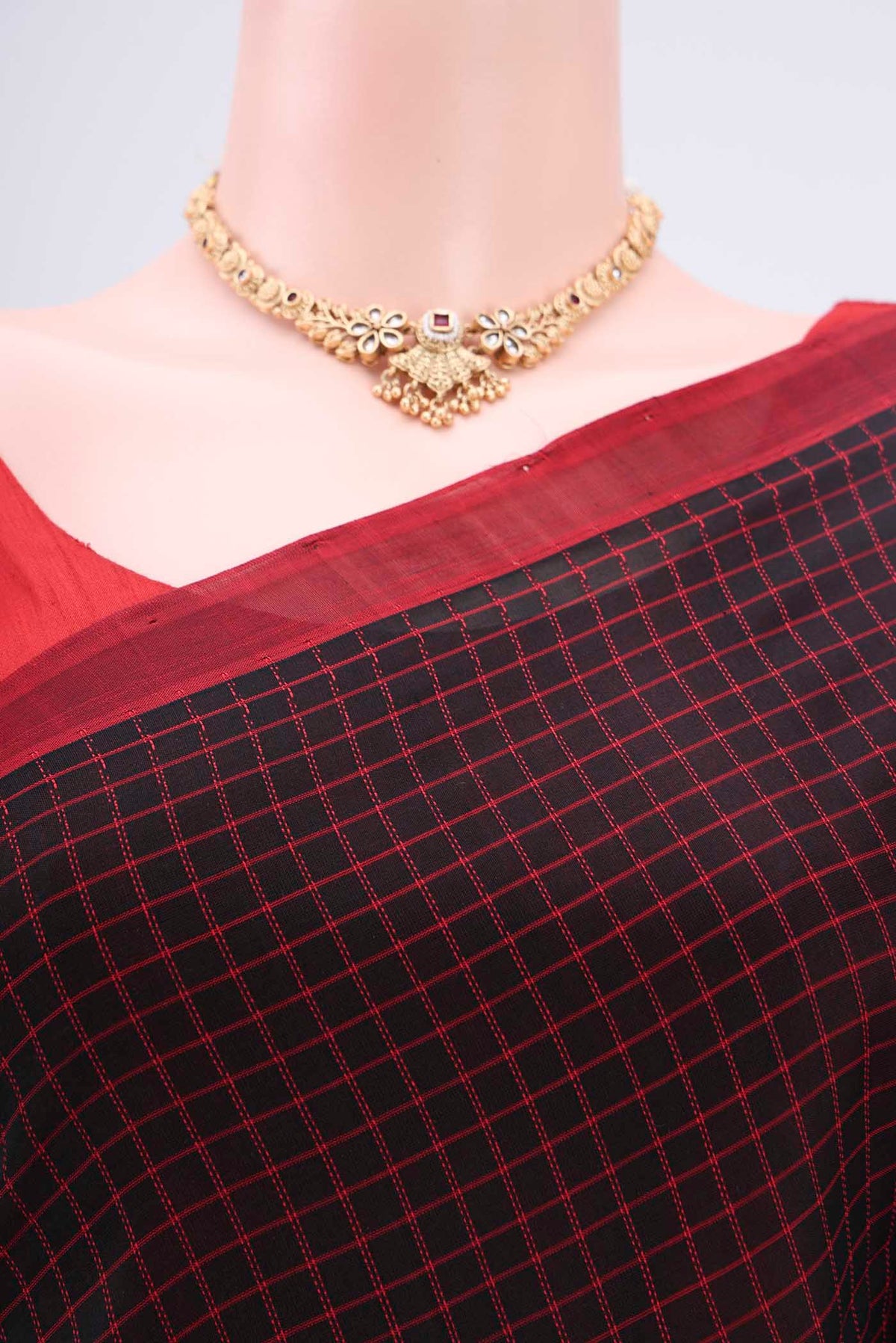 Border image of Black Coimbatore Silk Cotton Saree with Checked design on the body and Thread Border. 