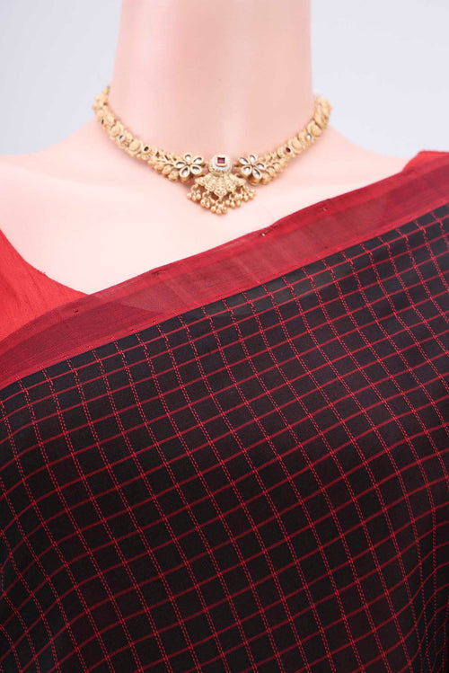 Border image of Black Coimbatore Silk Cotton Saree with Checked design on the body and Thread Border. 