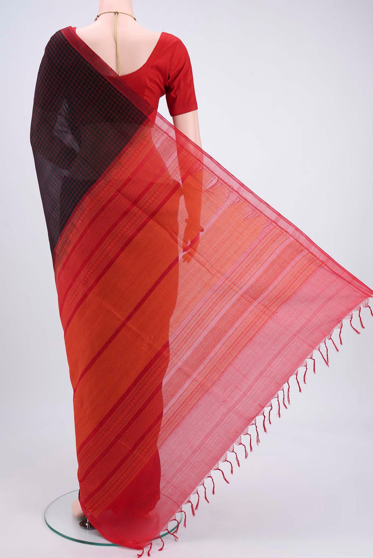 Flat view of Black Coimbatore Silk Cotton Saree with Checked design on the body and Thread Border. 