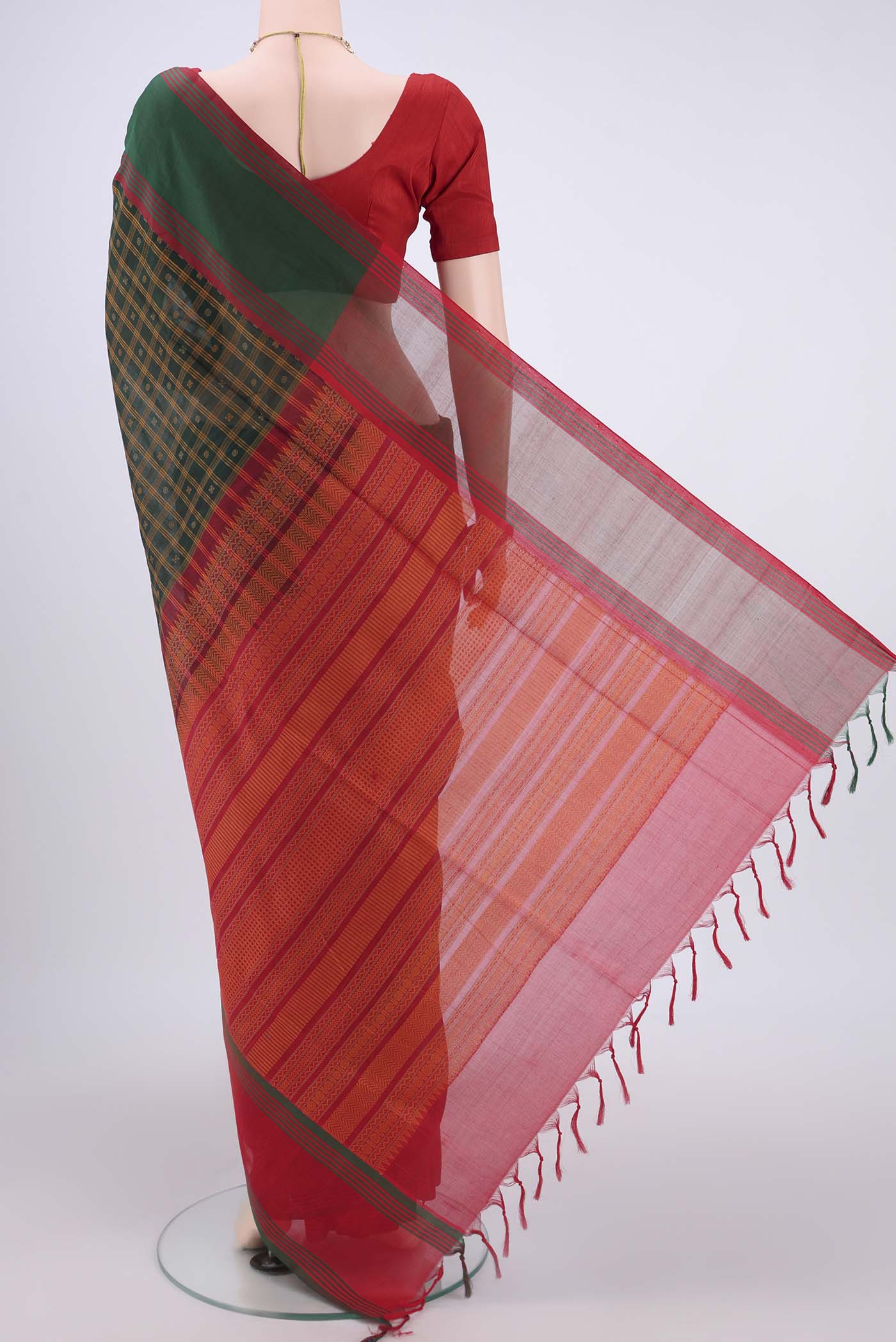 Flat view of Bottle Green Silk Cotton Saree with Checked design on the body and Plain Border. 