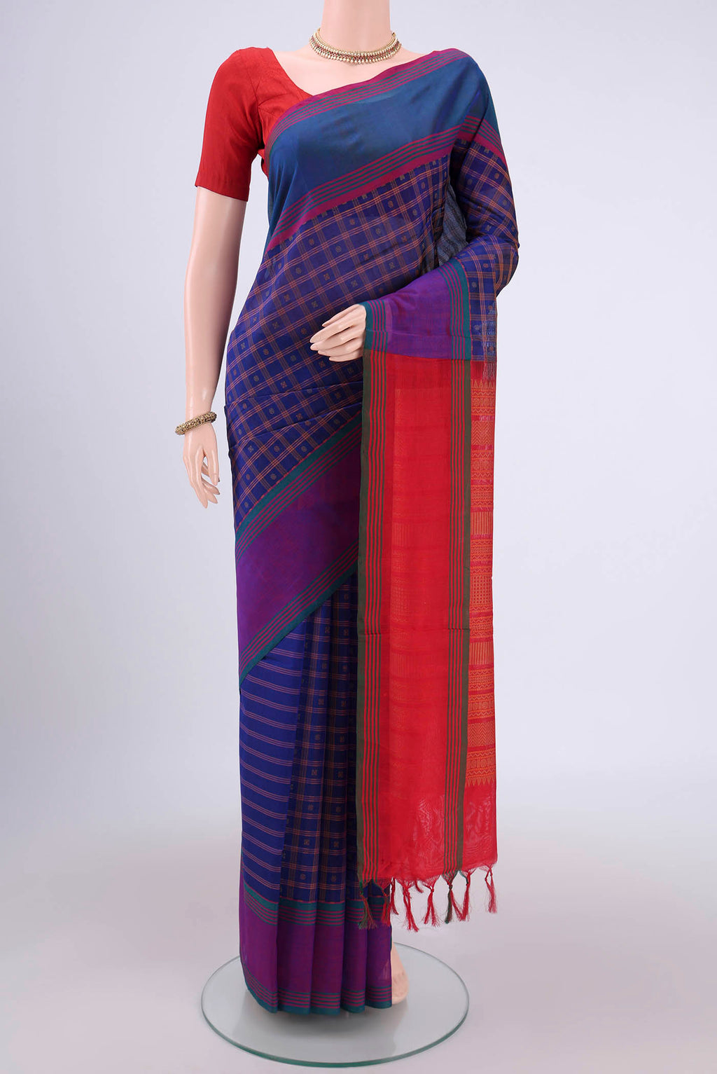 Royal Blue Silk Cotton Saree with Checked design on the body and Plain Border.  displayed on a mannequin
