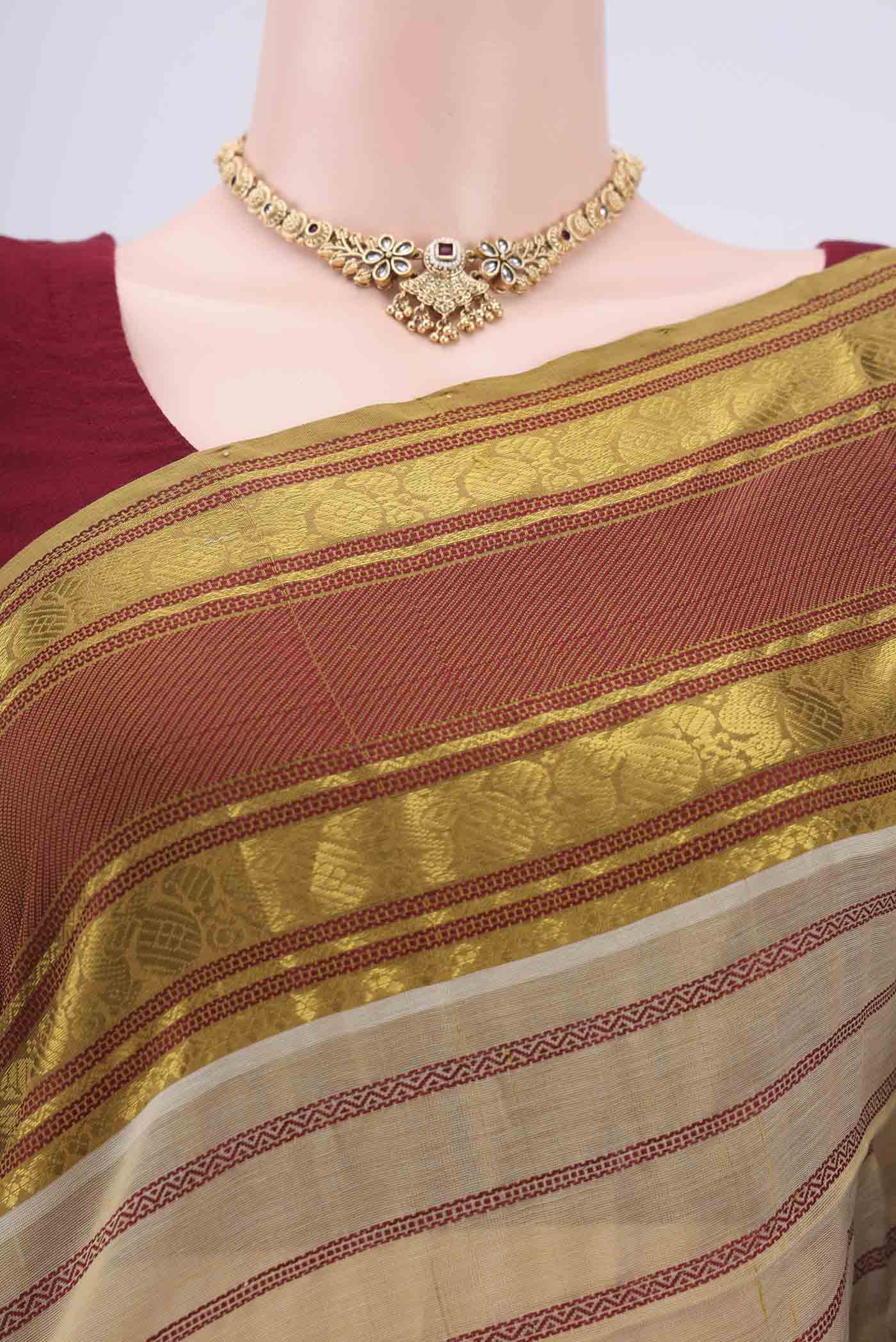Border image of Beige Silk Cotton Saree with Veldhari on the body and Zari And Thread Border. 
