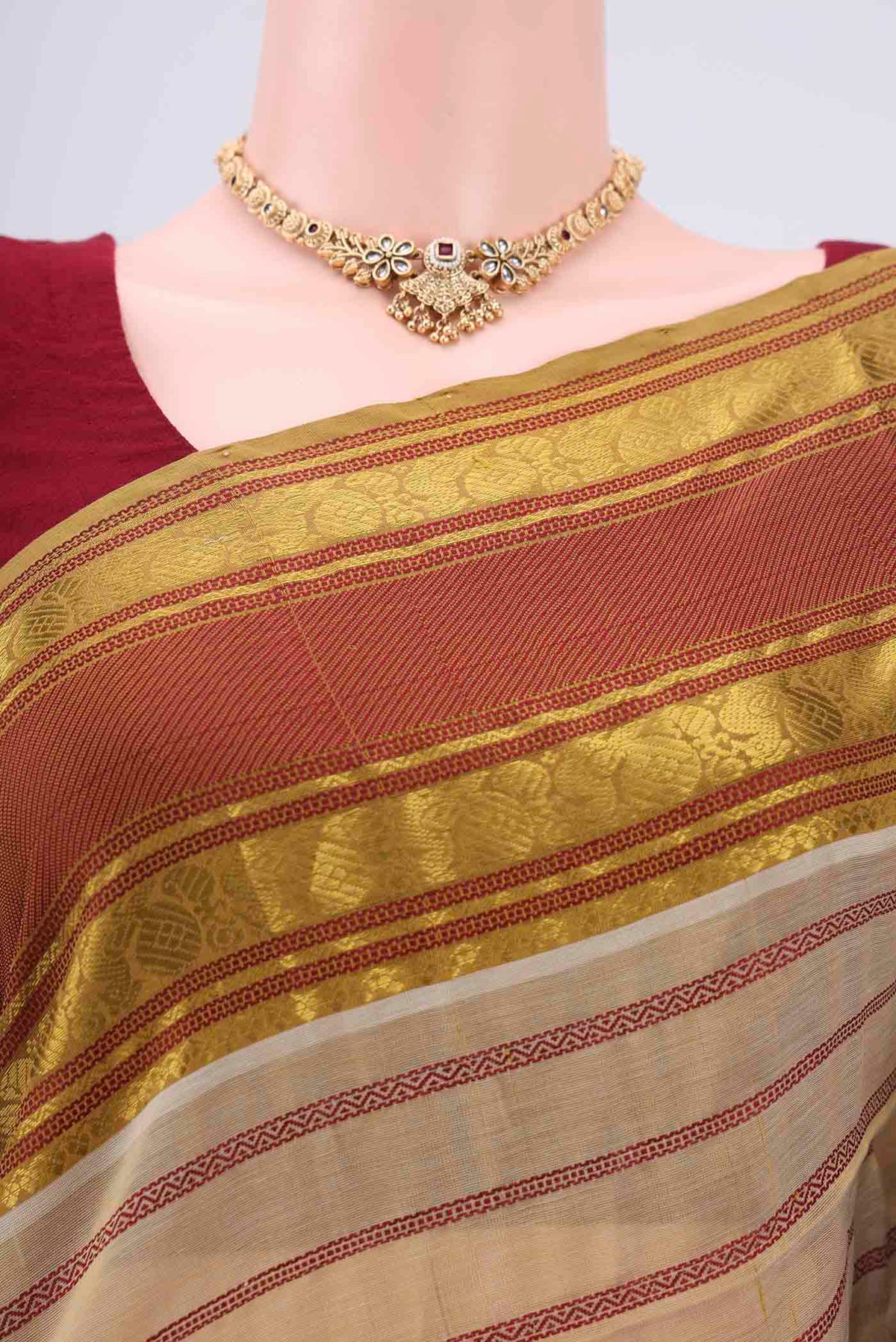Border image of Beige Silk Cotton Saree with Veldhari on the body and Zari And Thread Border. 