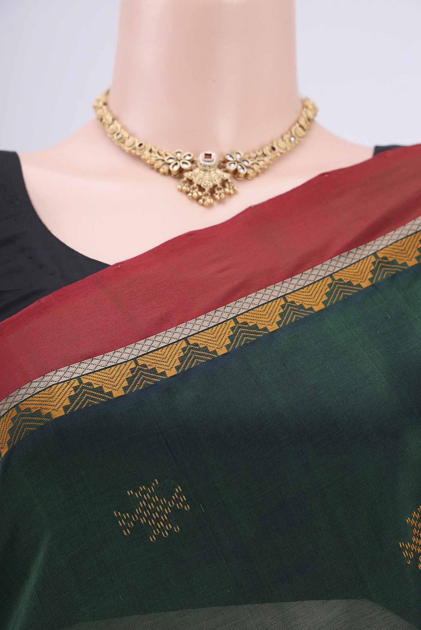 Border image of Bottle Green Coimbatore Silk Cotton Saree with Thread Butta on the body and Plain Border. 
