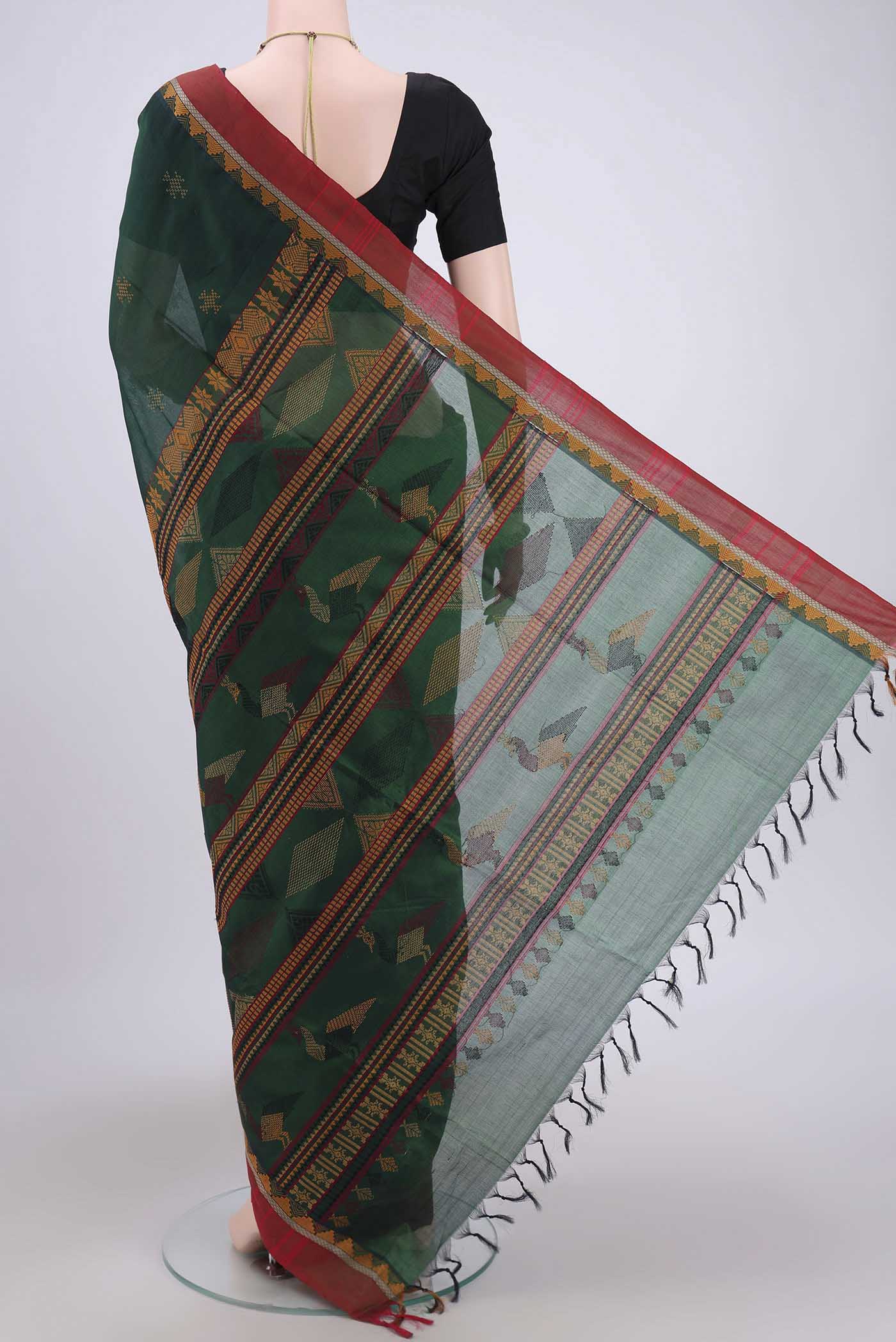 Flat view of Bottle Green Coimbatore Silk Cotton Saree with Thread Butta on the body and Plain Border. 