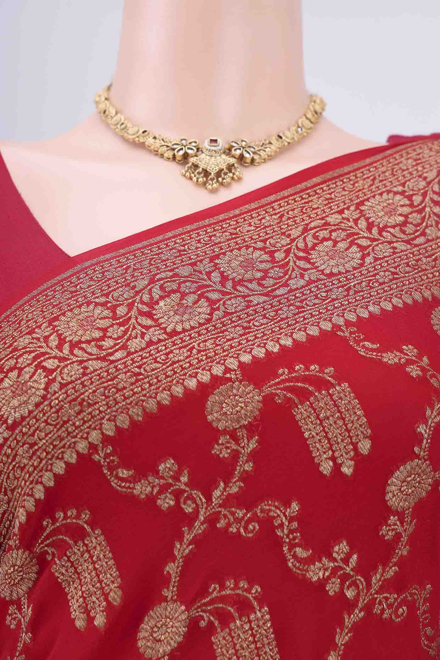Border image of Red Banarasi Georgette Saree with Zari Brocade on the body and Zari Border. 