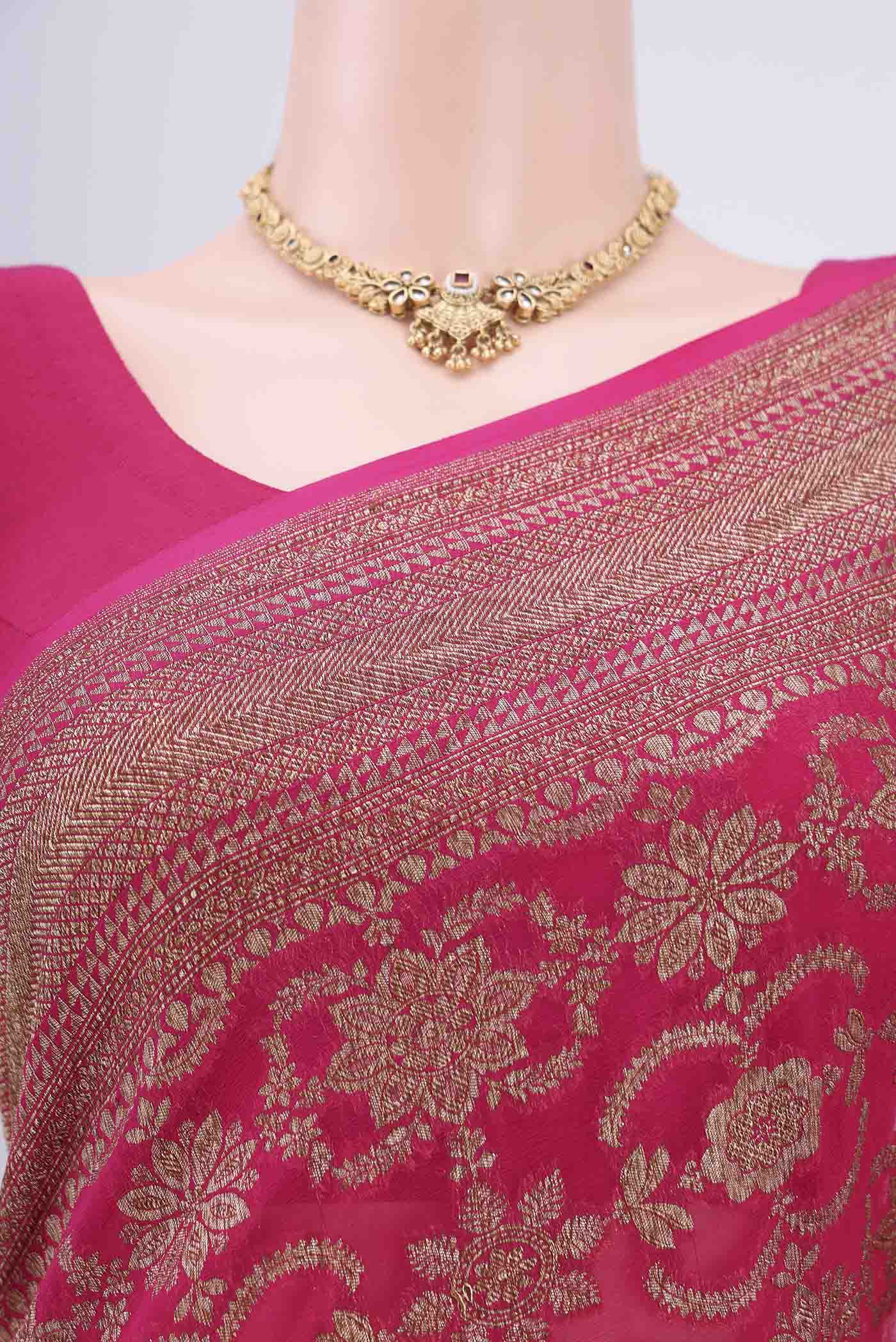 Border image of Rani Pink Banarasi Georgette Saree with Zari Brocade on the body and Zari Border. 
