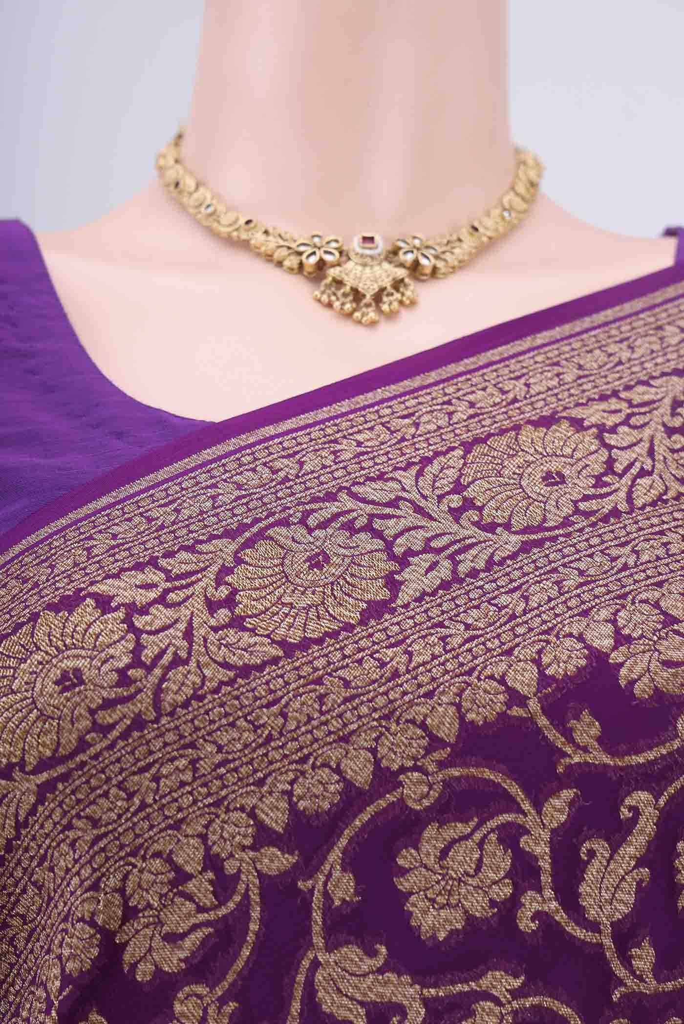 Border image of Purple Banarasi Georgette Saree with Zari Brocade on the body and Zari Border. 