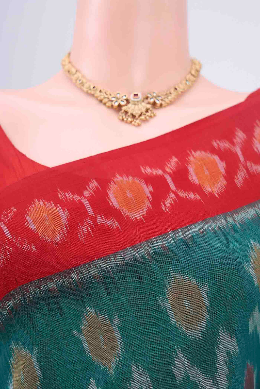 Border image of Sea Green Pochampally Cotton Saree with Ikat design on the body and Ikat Border. 