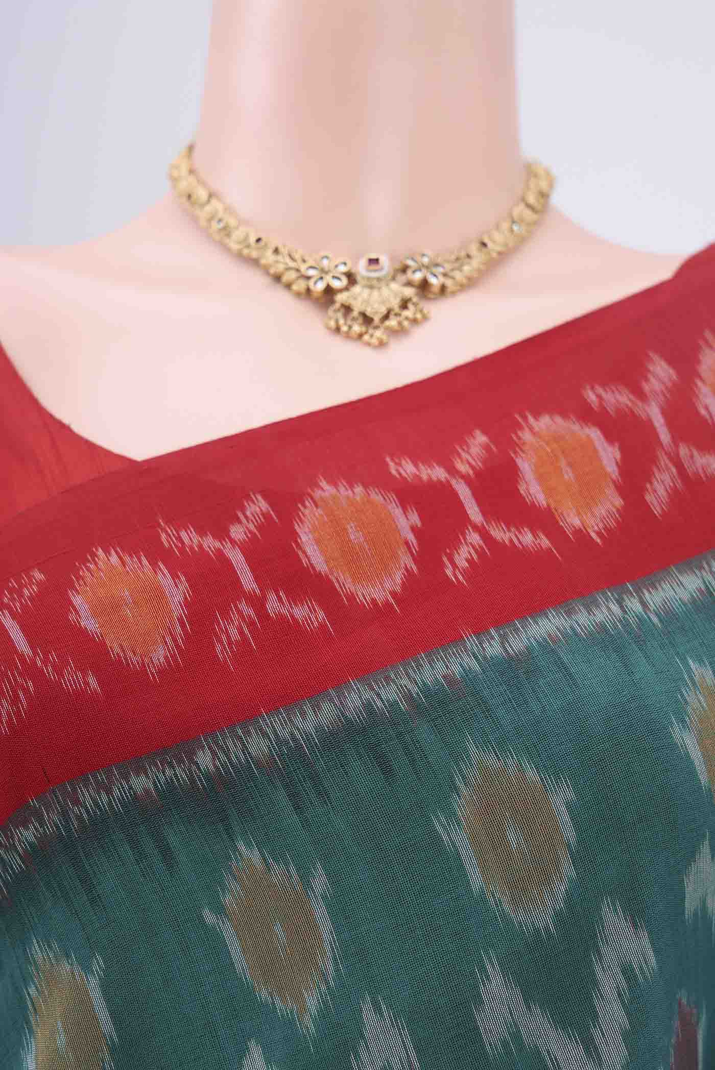 Border image of Sea Green Pochampally Cotton Saree with Ikat design on the body and Ikat Border. 