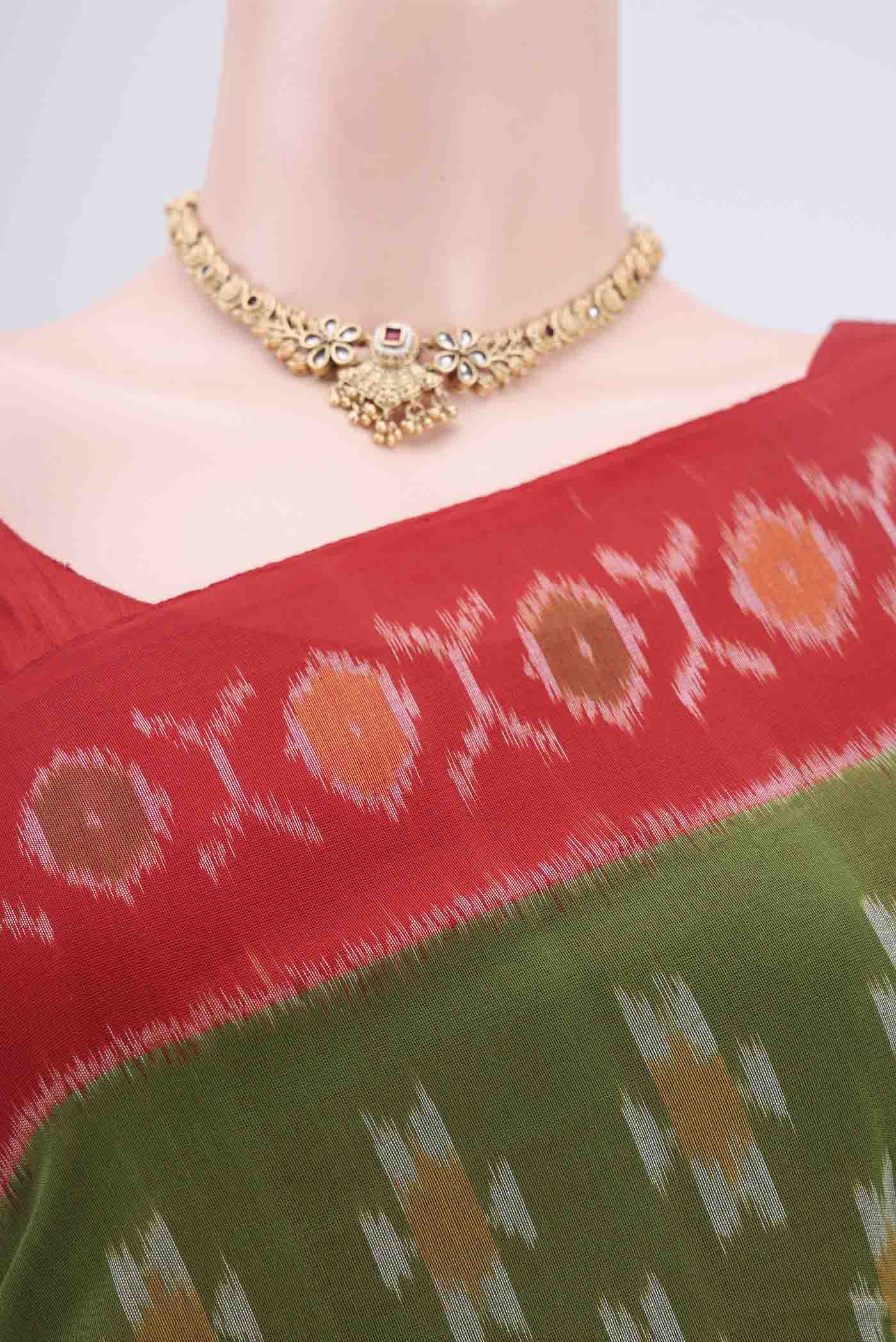 Border image of Light Green Pochampally Cotton Saree with Ikat design on the body and Ikat Border. 