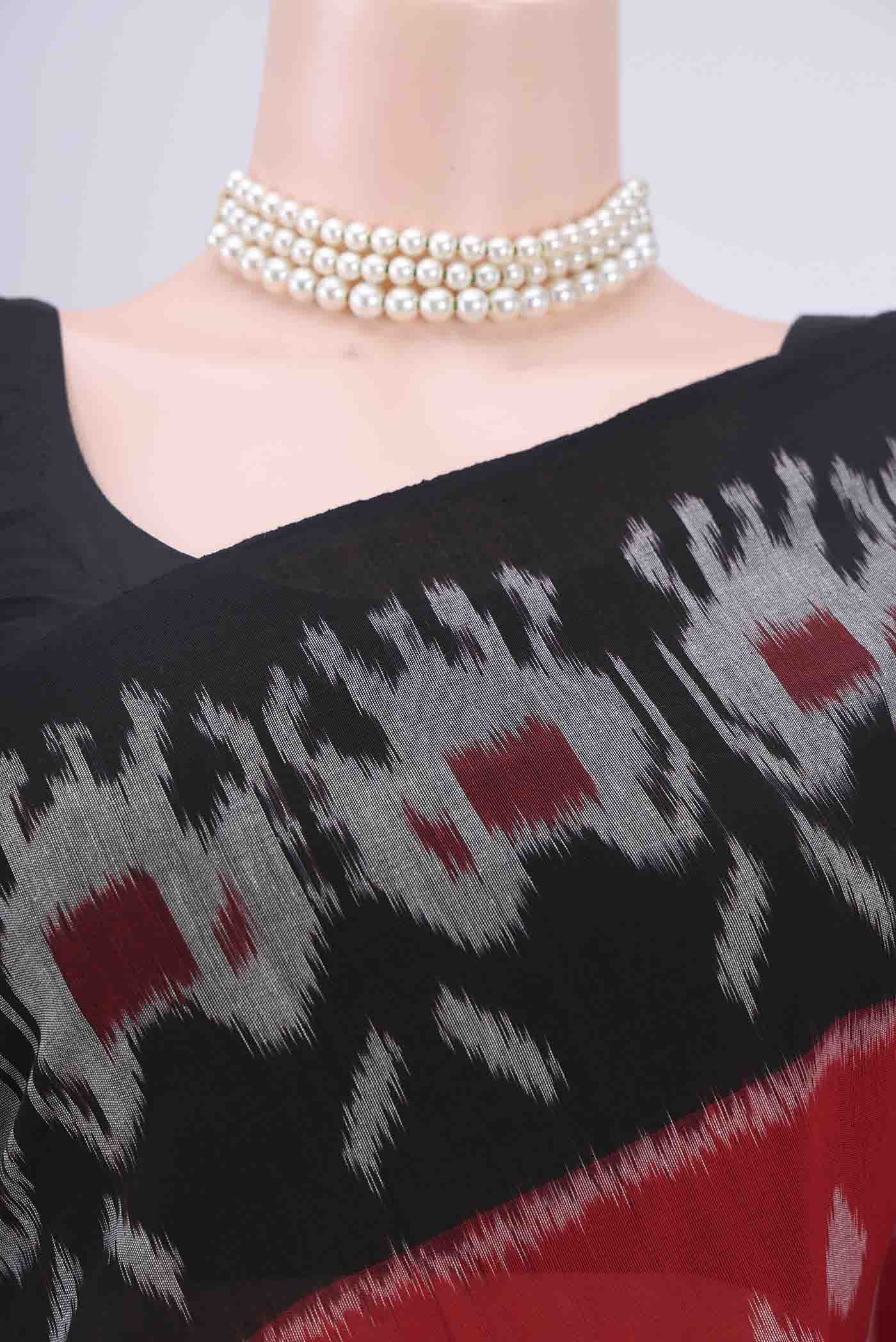 Border image of Red Pochampally Cotton Saree with Ikat design on the body and Ikat Border. 
