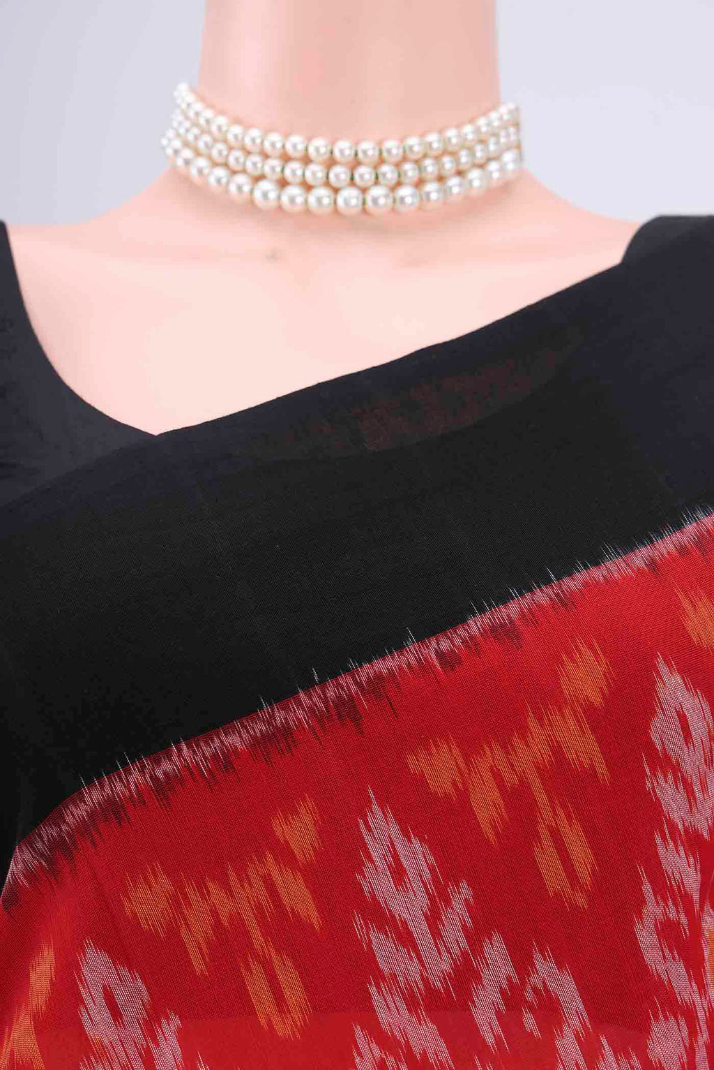 Border image of Red Pochampally Cotton Saree with Ikat design on the body and Ikat Border. 