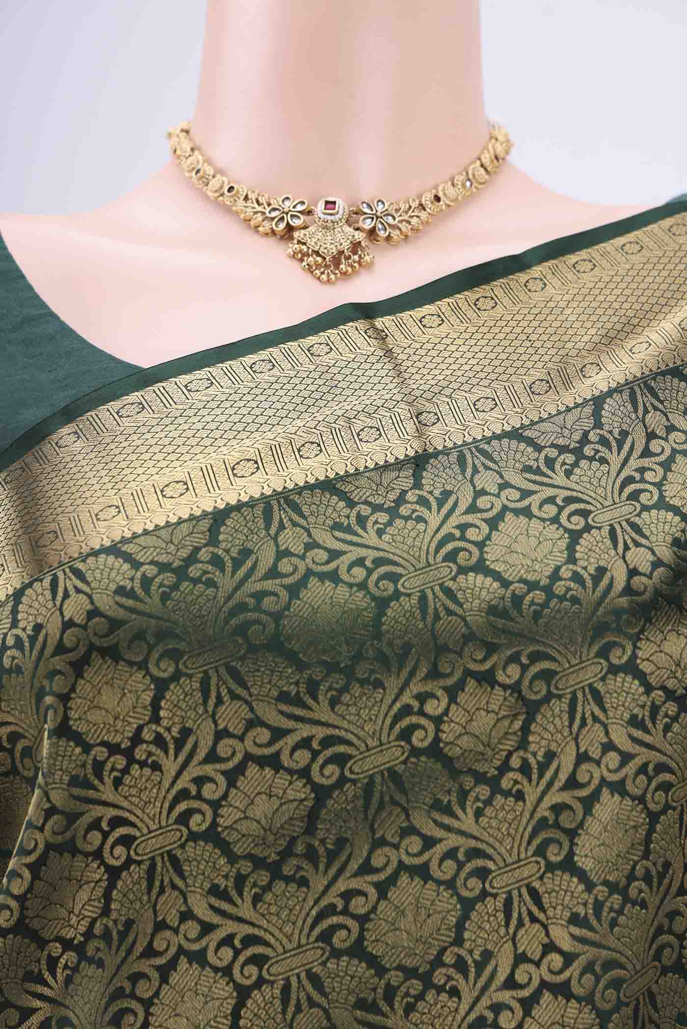 Border image of Bottle Green Soft Silk Saree with Zari Brocade on the body and Zari Border. 